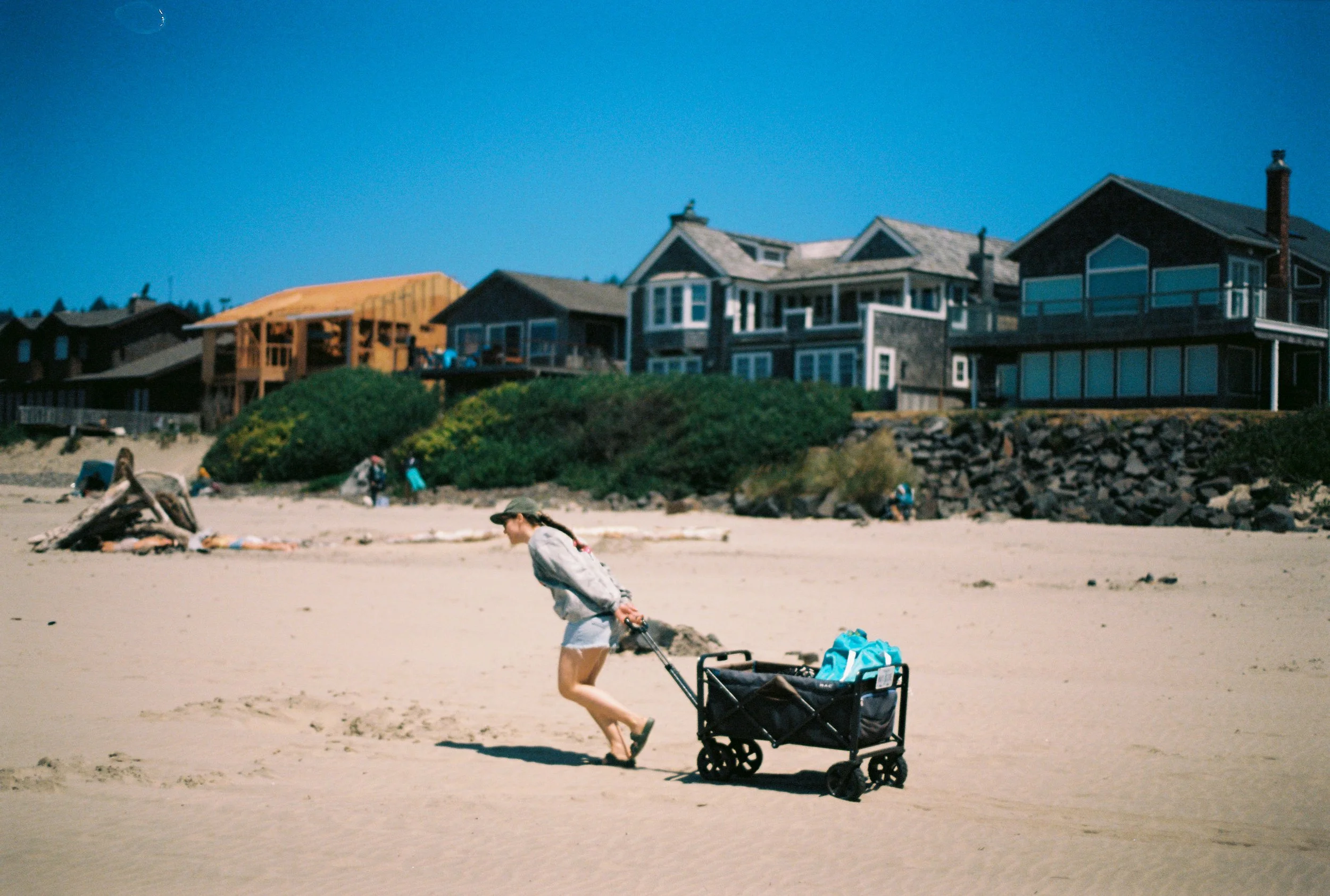 pnw37-woman-pulling-wagon-on-beach.jpg