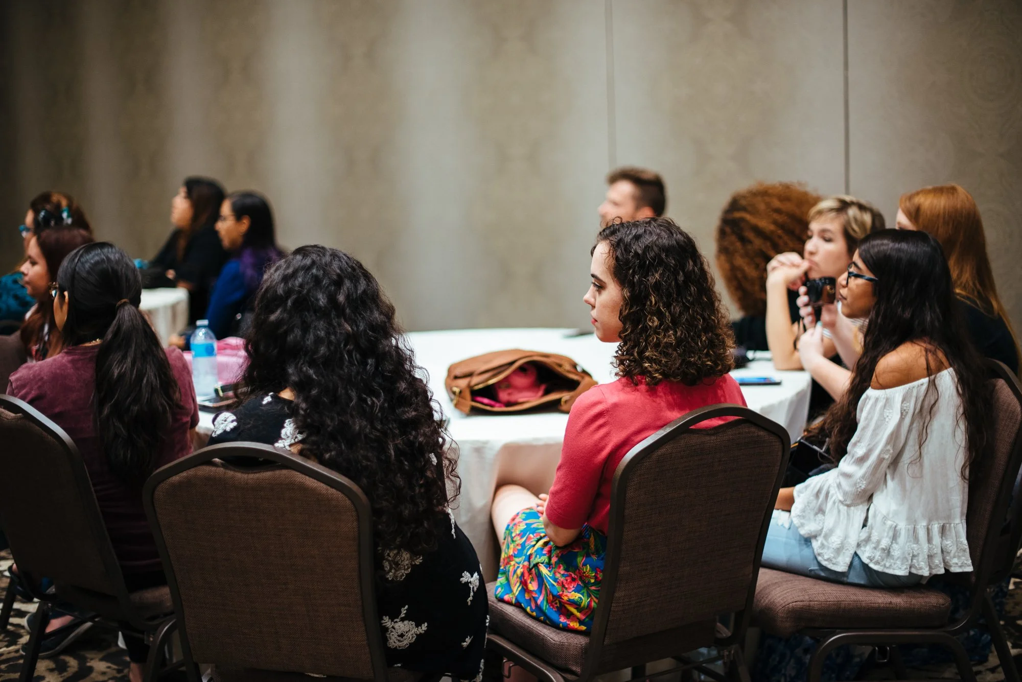 BT134-crowd-listening-to-panel-at-table.jpg