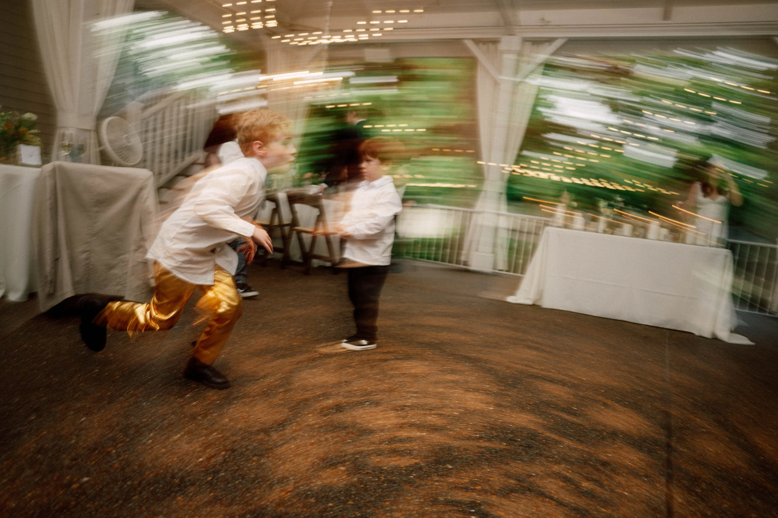 HRD61-boys-dancing-motion-blur-wedding.jpg