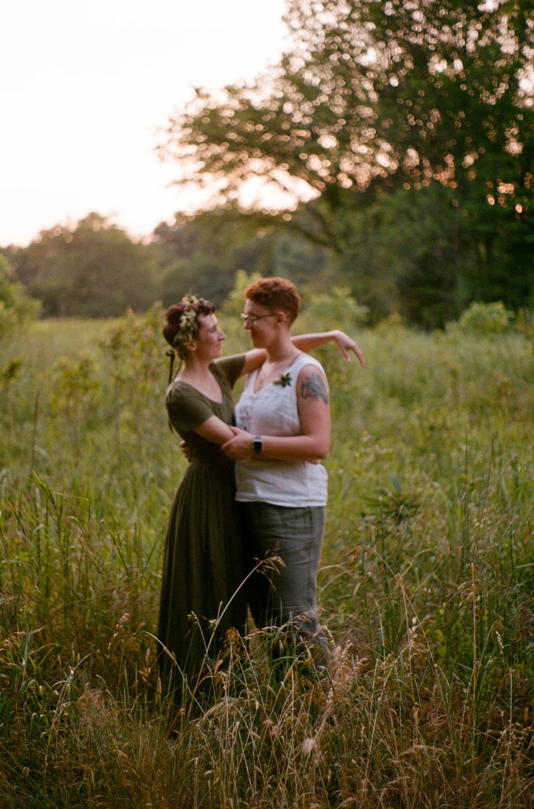 REW89-lgbtq-couple-sunset-field.jpg