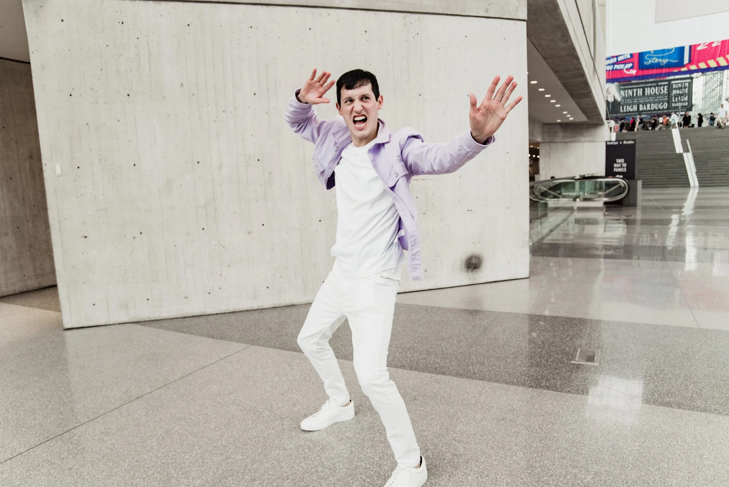 BT280-man-angry-face-arms-up-javits.jpg