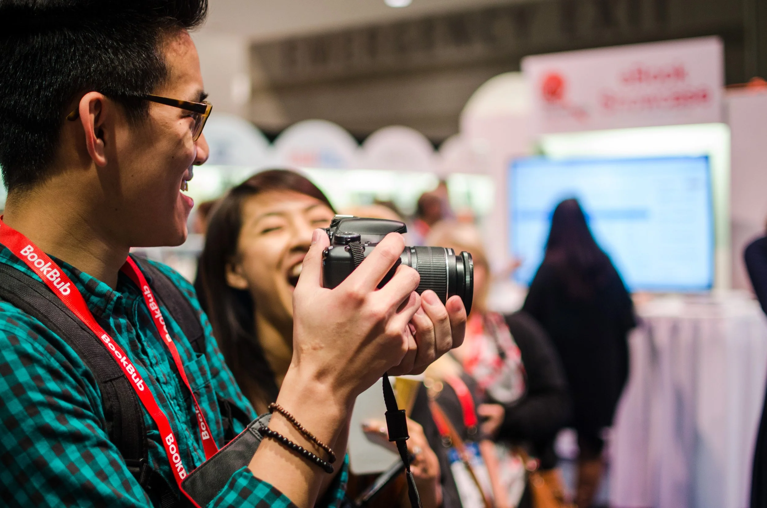 BT28-man-holding-camera-smiling.jpg
