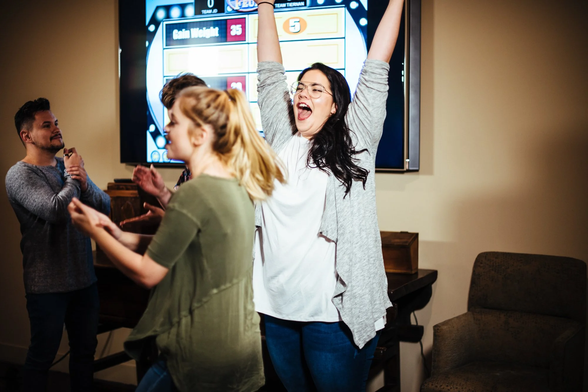 BT239-woman-excited-arms-raised.jpg