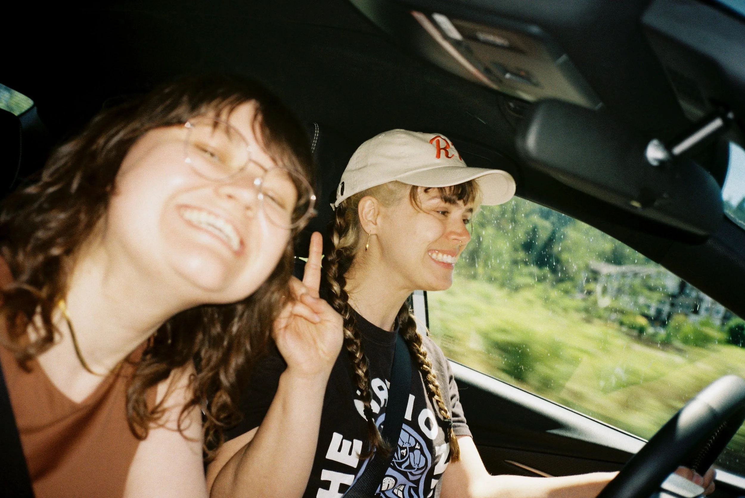 pnw225-two-women-smiling-in-car-selfie.jpg