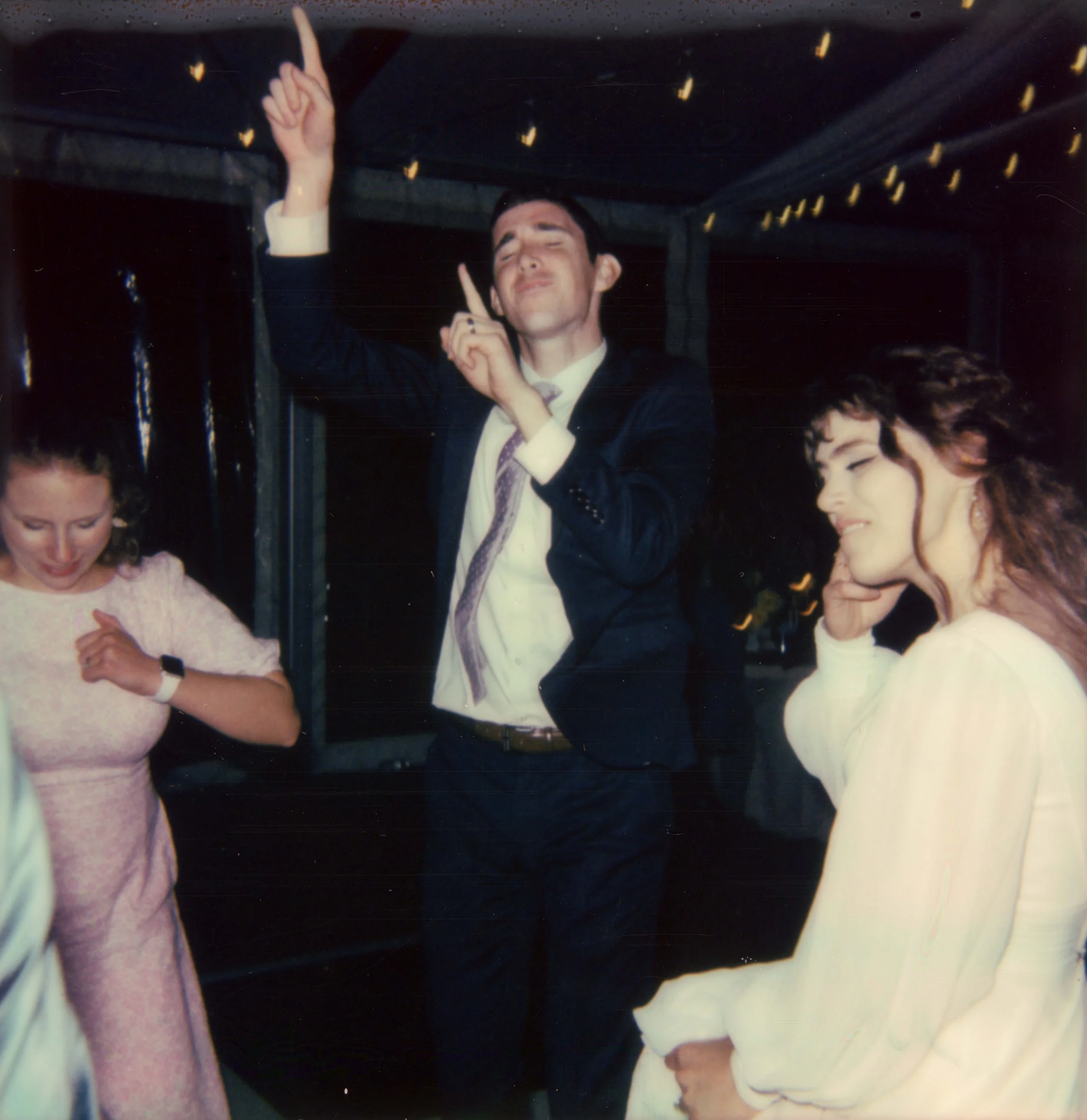 LBW123-polaroid-wedding-guest-dances-with-bride.jpg