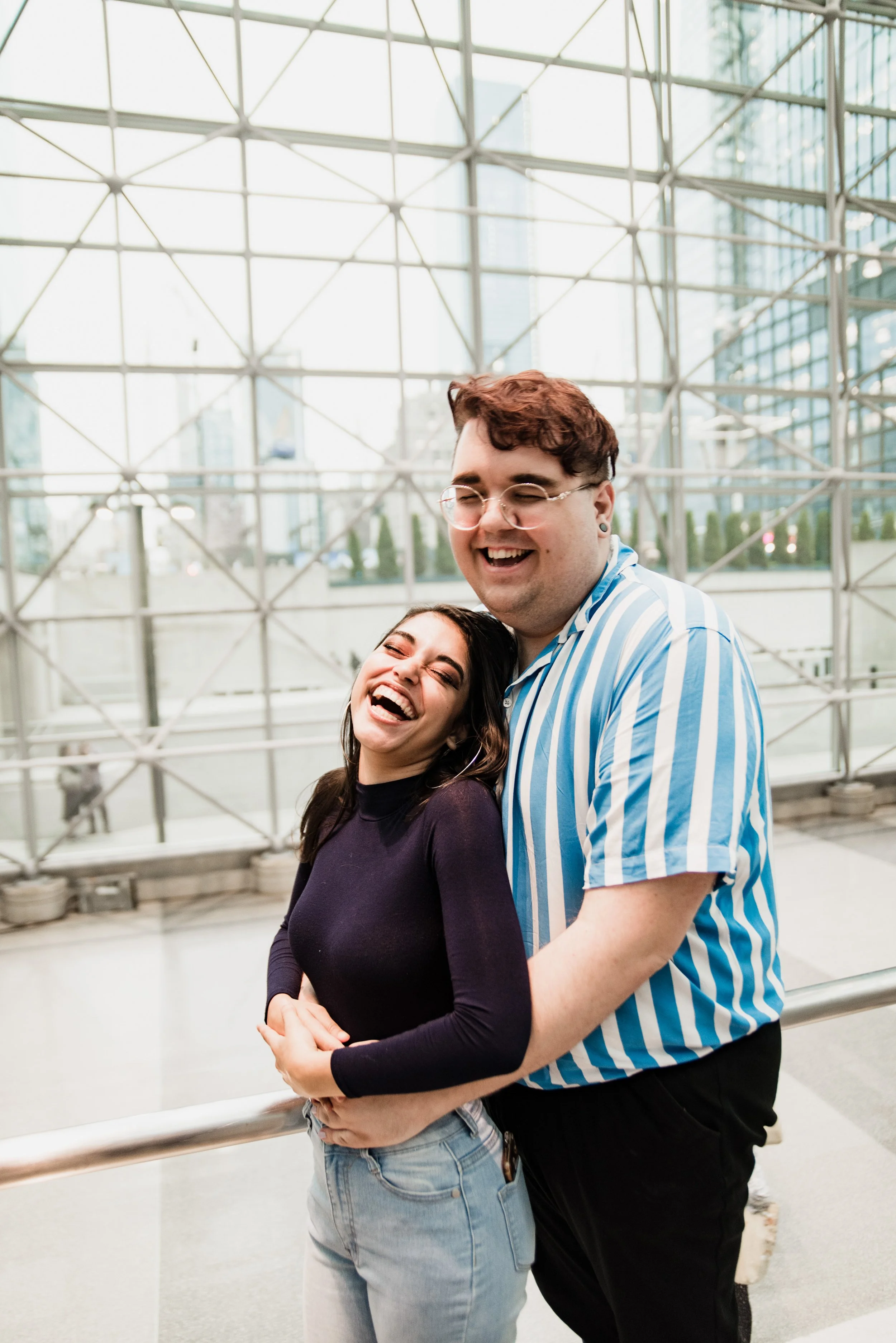 BT266-nonbinary-people-laughing-prom-pose.jpg