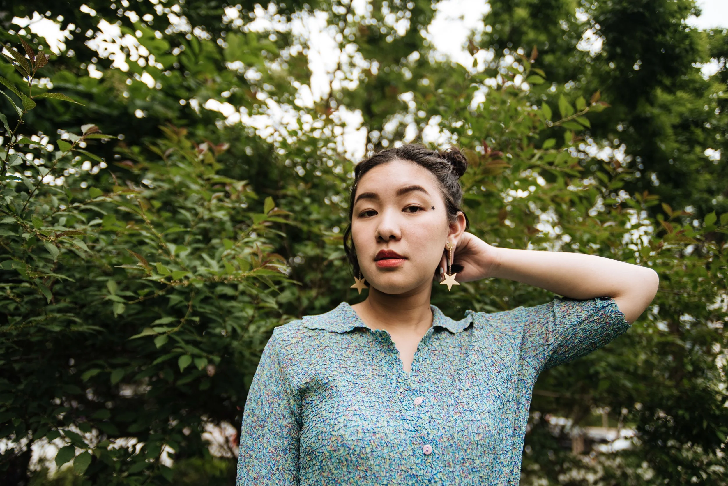 BT378-asian-woman-star-earrings.jpg