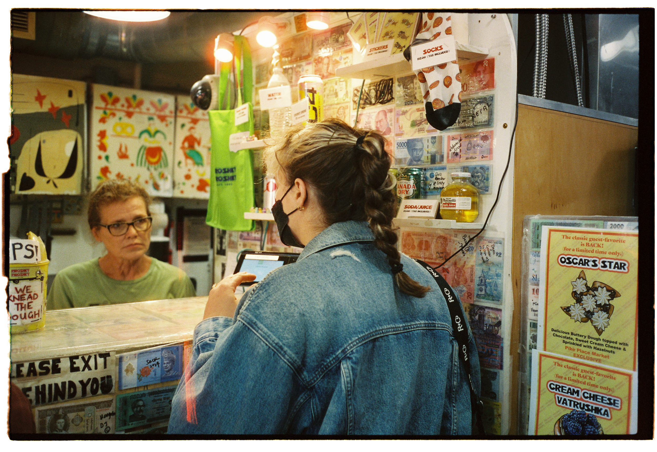 pnw181-woman-ordering-piroshky-piroshky-seattle-washington.png
