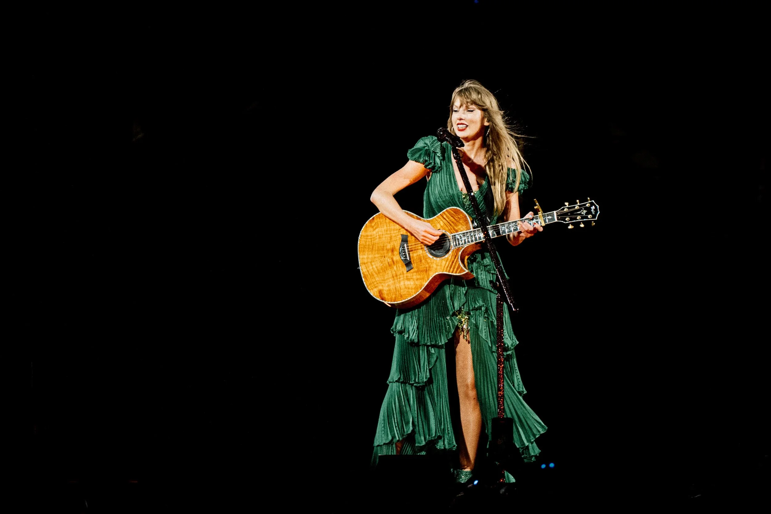 taylor-swift-surprise-song-guitar-green-dress-chicago-eras-tour-1.jpg