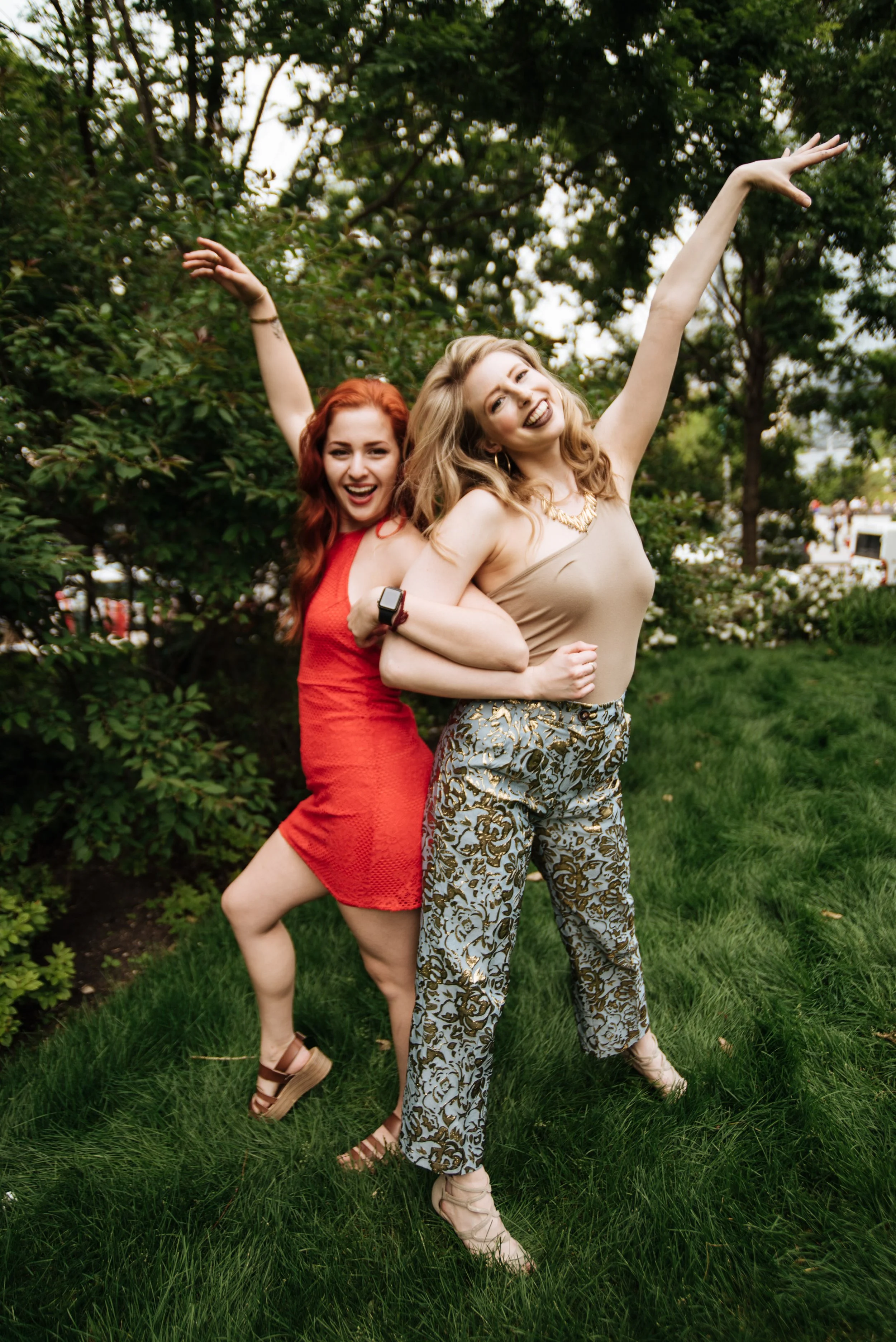 BT367-two-women-arms-up-linked.jpg
