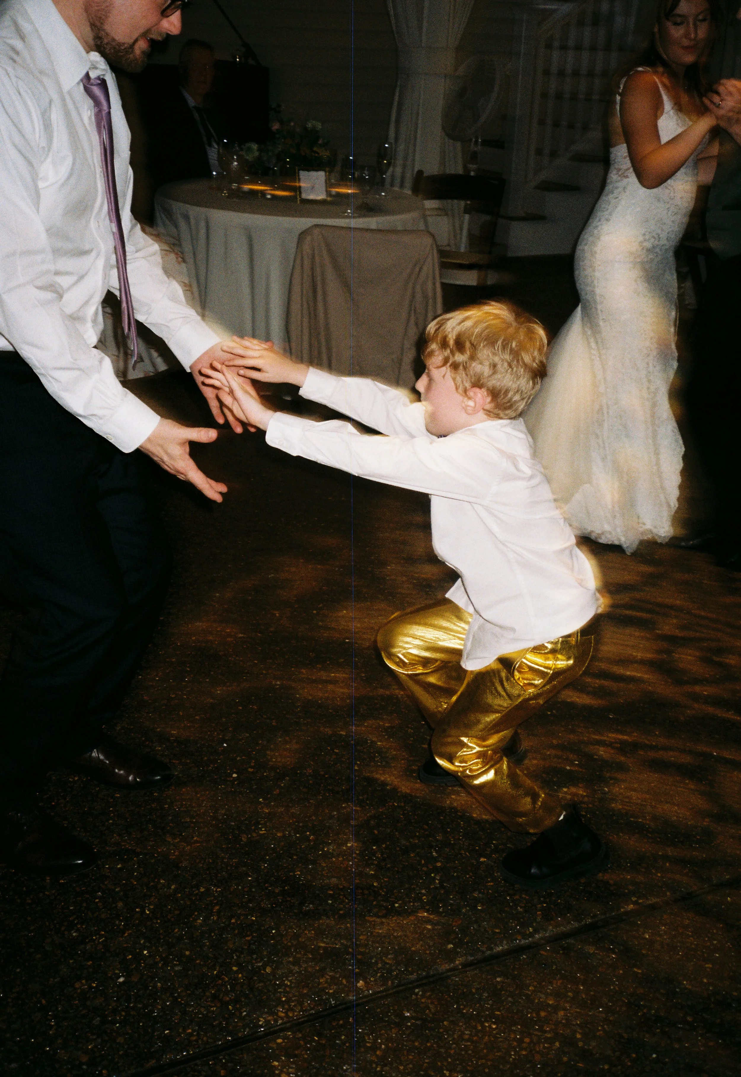 HRF70-boy-dancing-at-wedding-reception.jpg