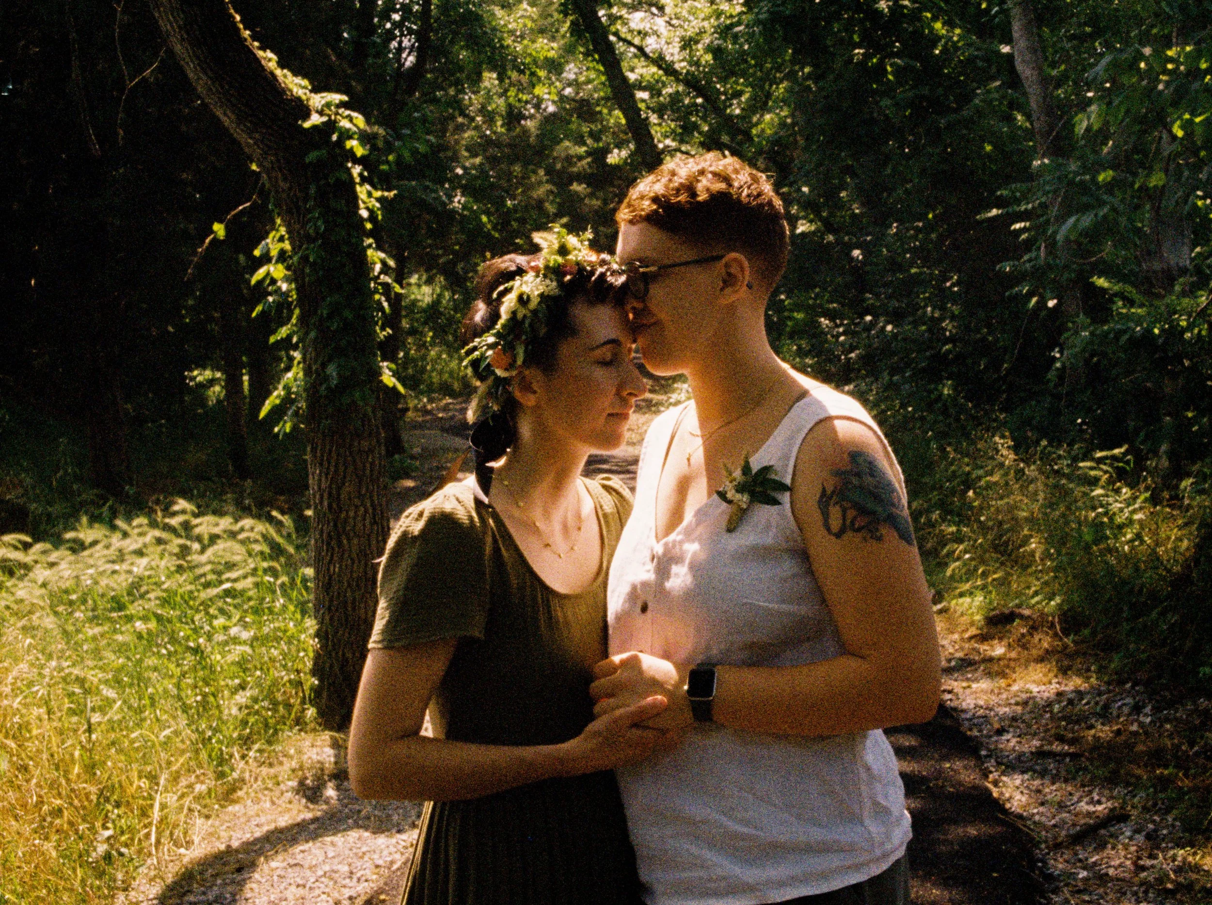 REW07-queer-couple-holding-each-other.jpg