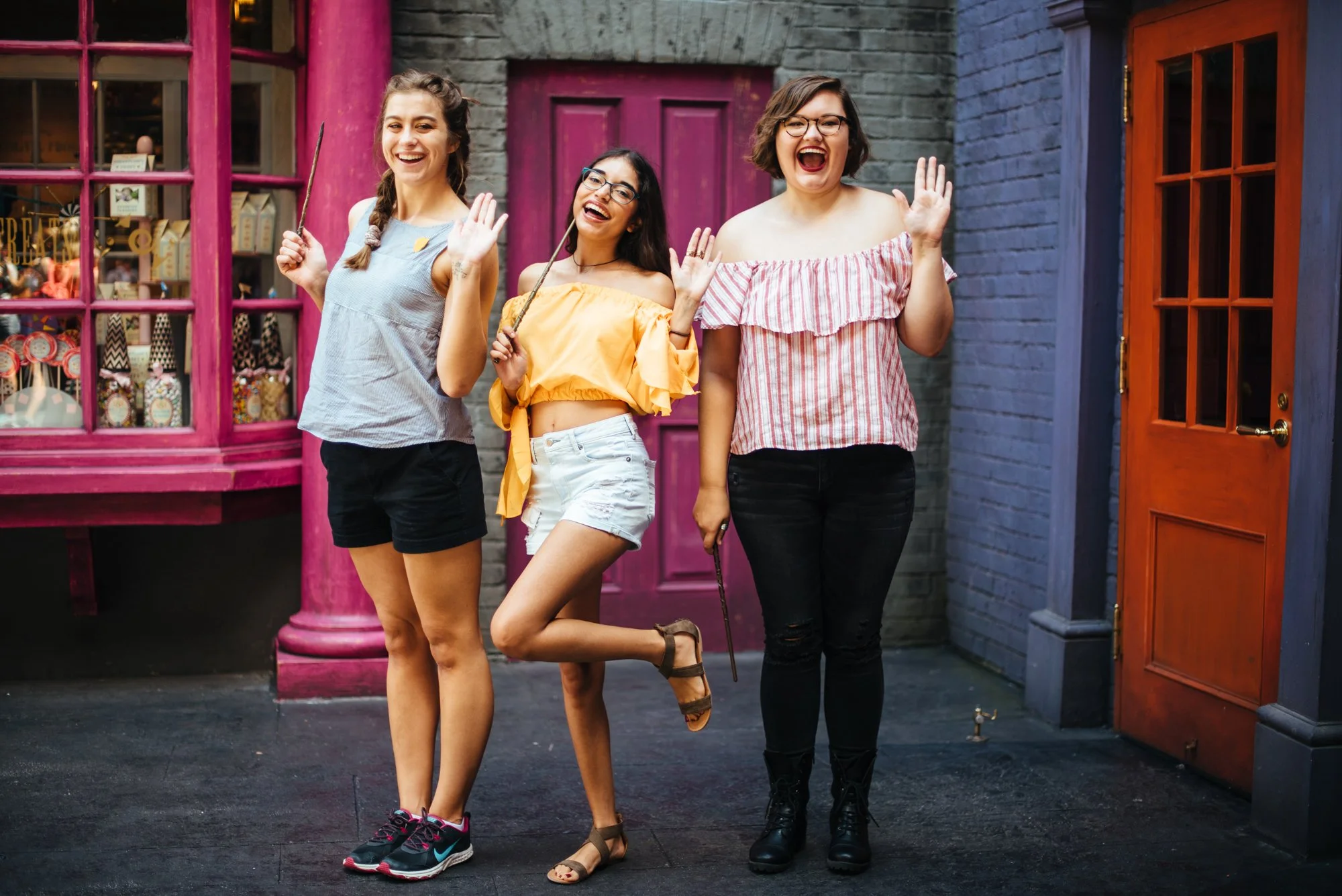 BT102-three-people-with-magic-wands.jpg