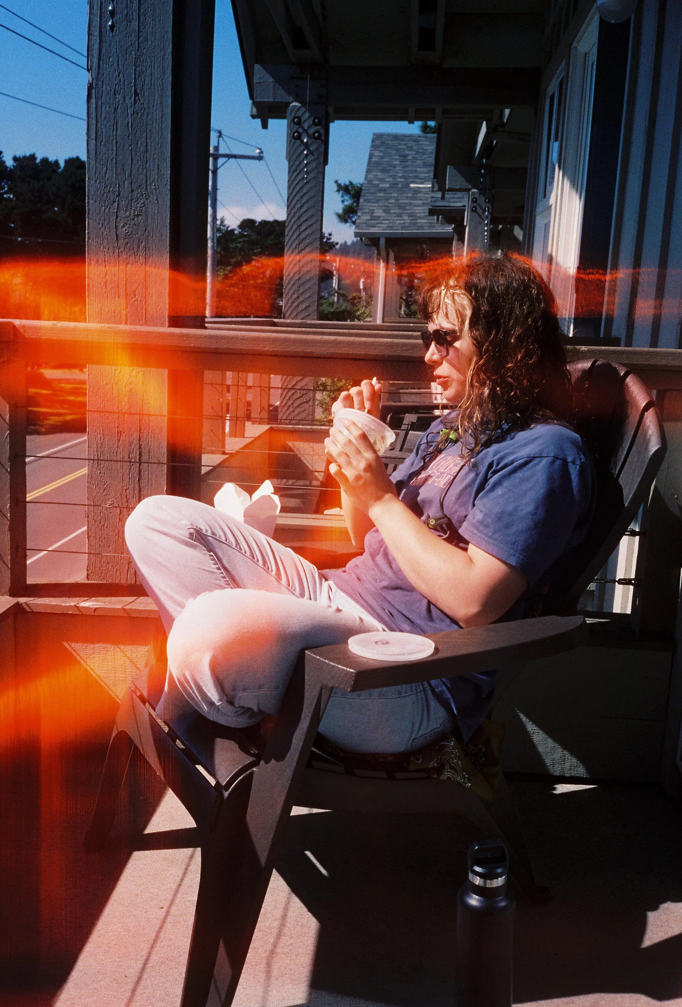 pnw45-woman-eating-on-balcony-wayside-inn.jpg