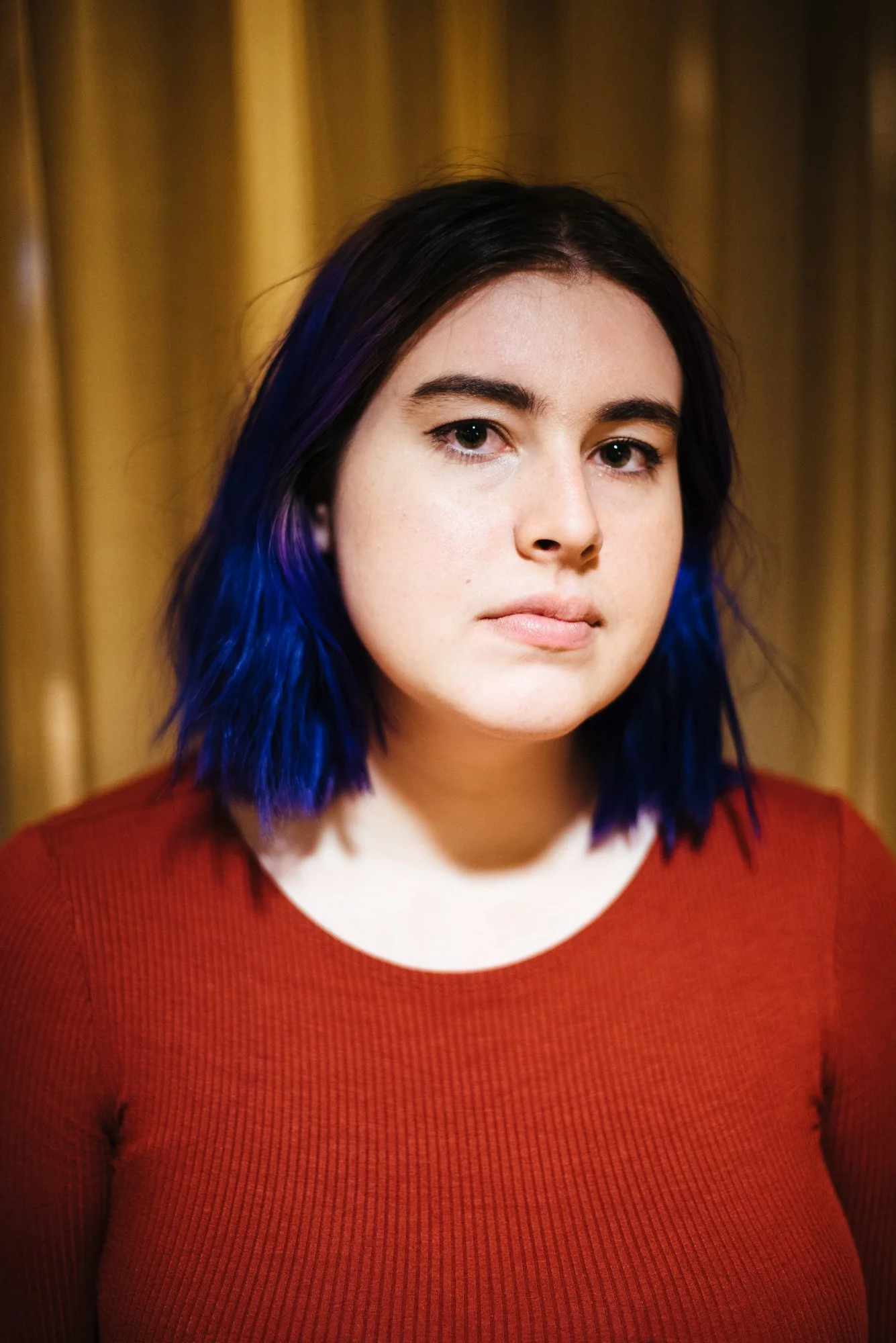 BT153-white-woman-purple-hair-gold-backdrop.jpg