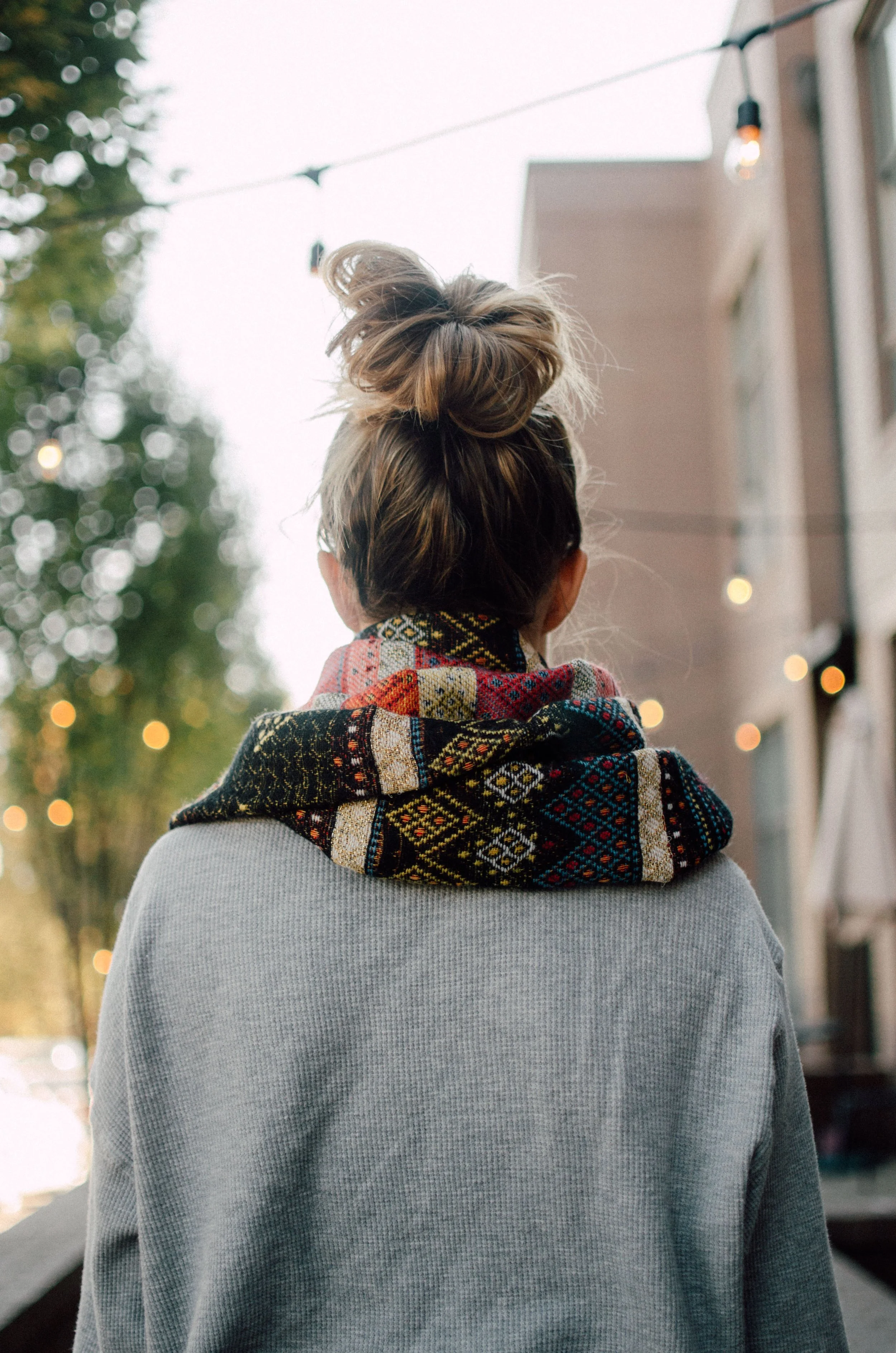 d184-woman-scarf-top-bun-from-behind.jpg