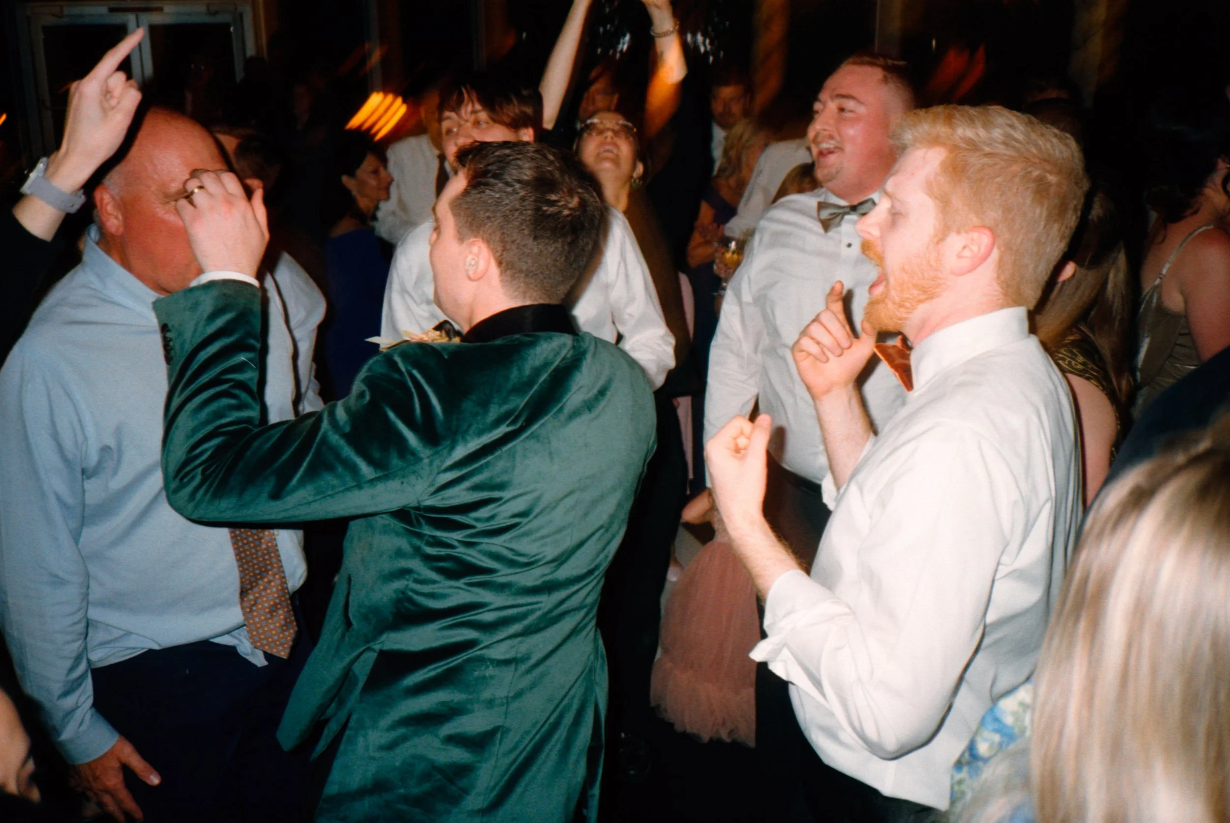 LBW125-wedding-guests-dancing-at-reception.jpg