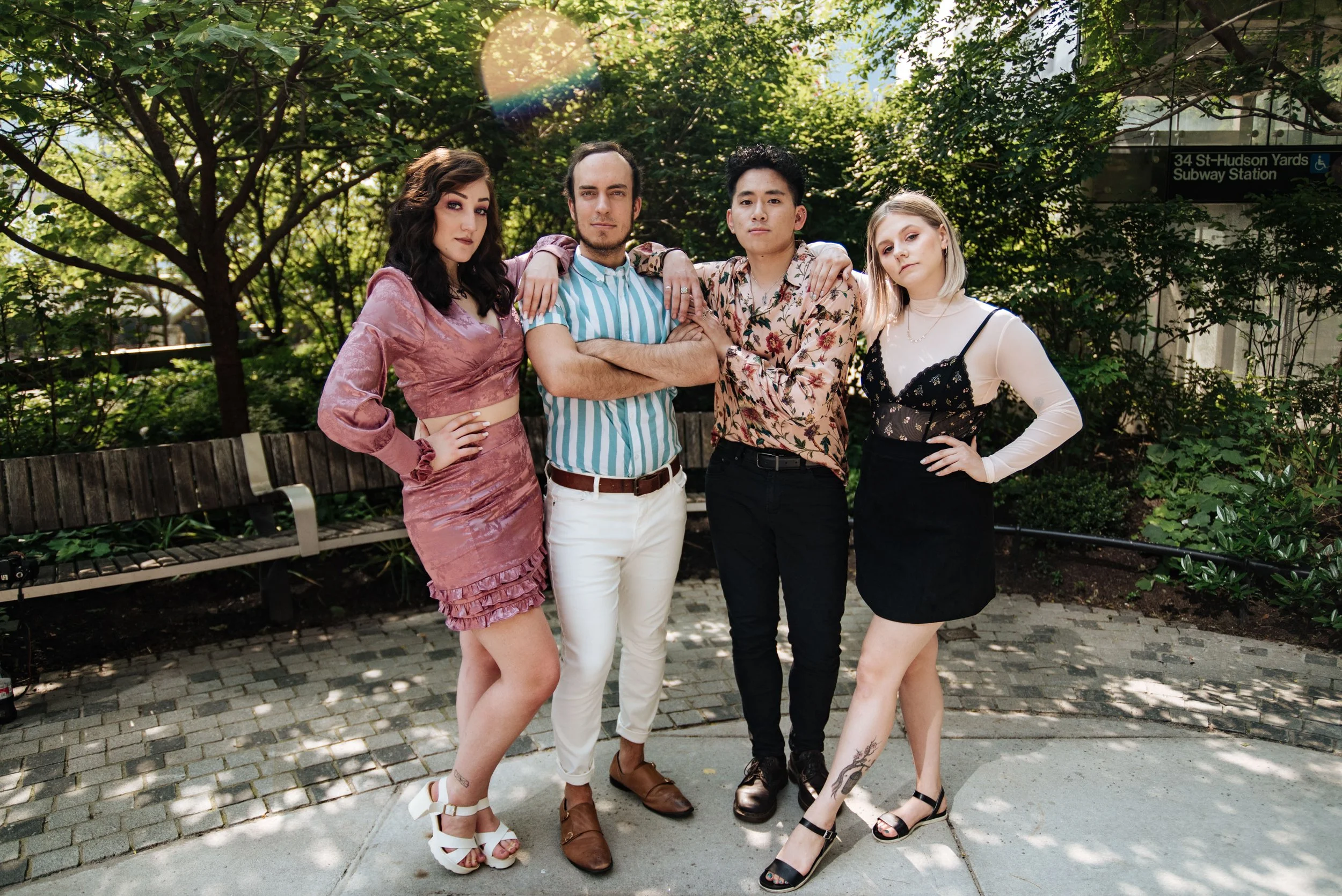 BT421-four-people-posing-dramatically.jpg