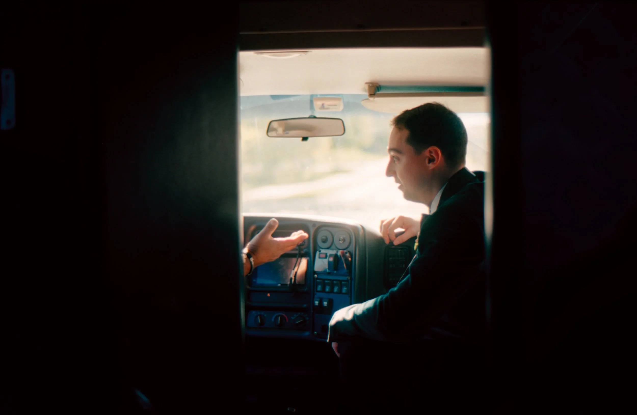 LBW29-groom-talking-to-driver-limo.jpg