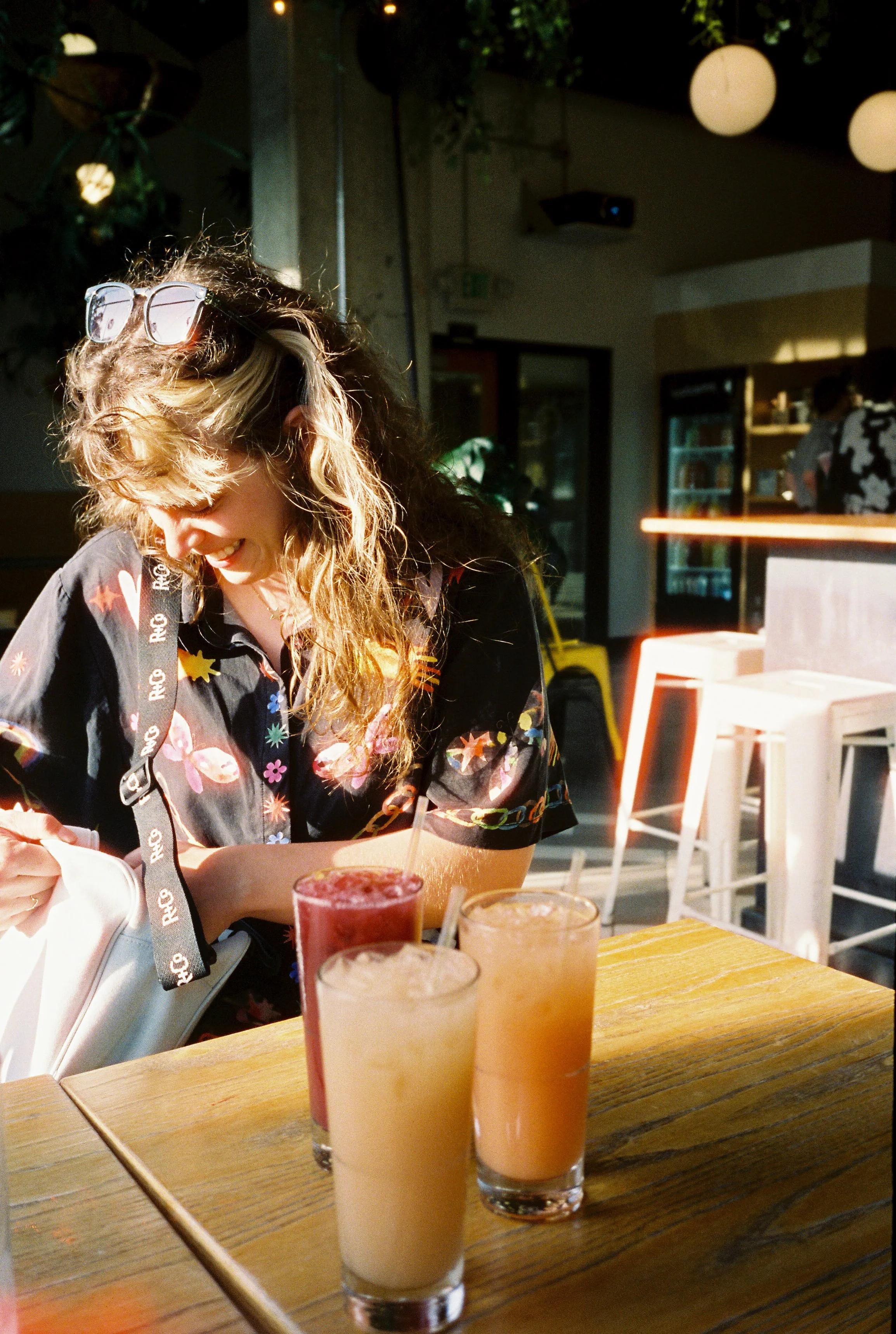 pnw200-woman-with-ginger-beer-drinks-in-sunlight.jpg