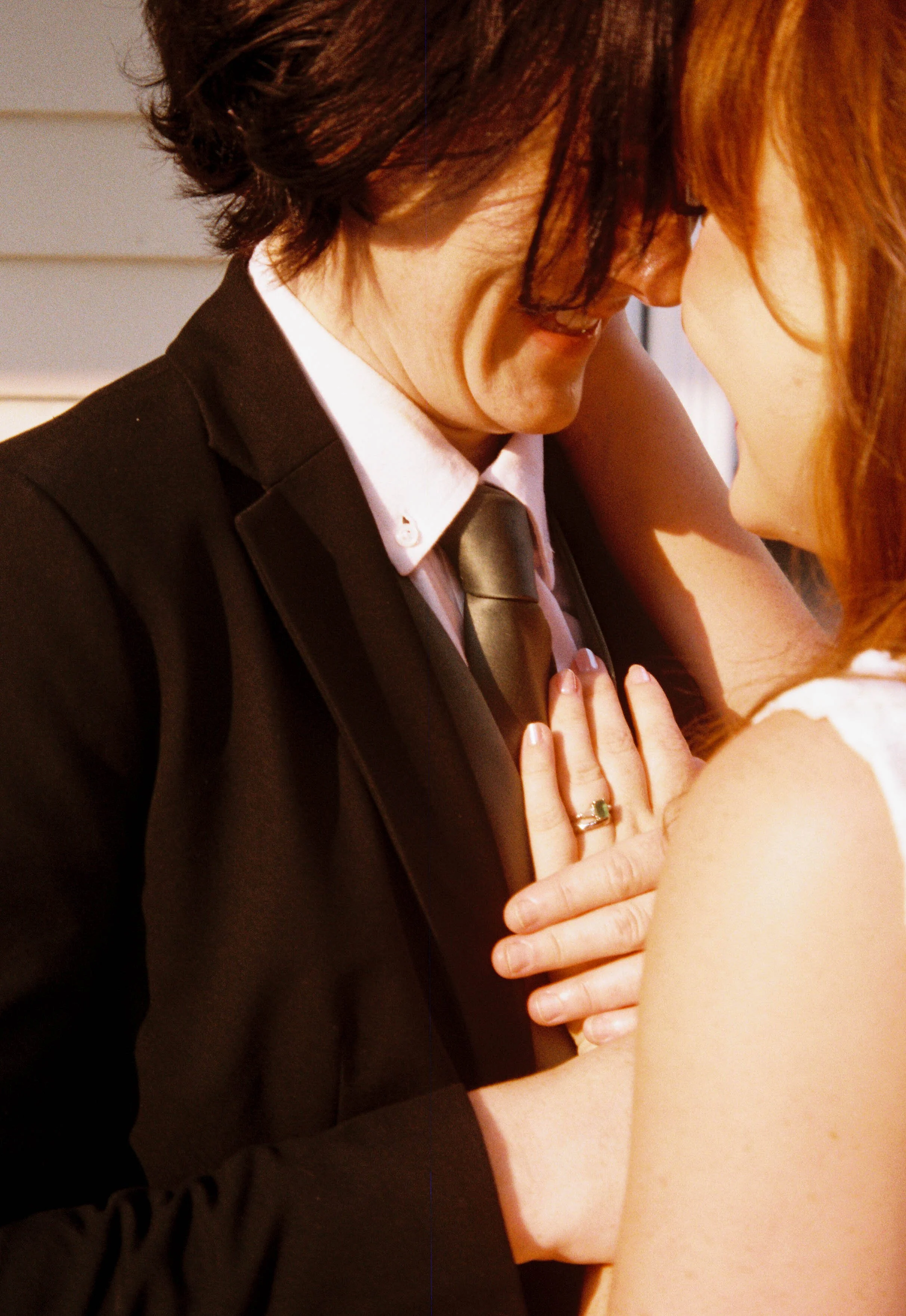 HRF53-brides-in-sunlight-wearing-rings.jpg