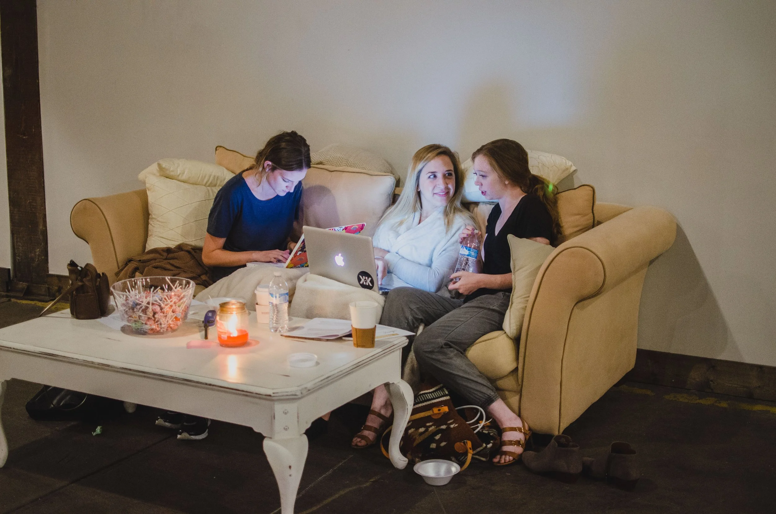 d107-women-working-on-couch-laptops.jpg