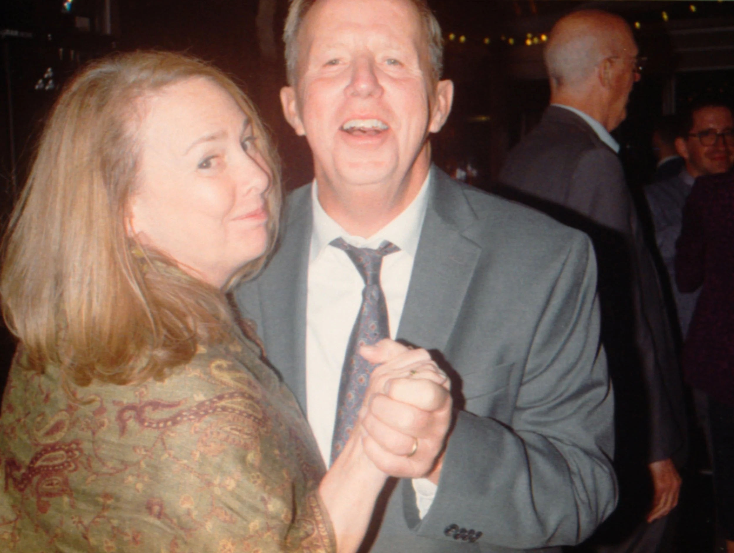 LBW137-wedding-guests-smiling-dancing-at-reception.jpg