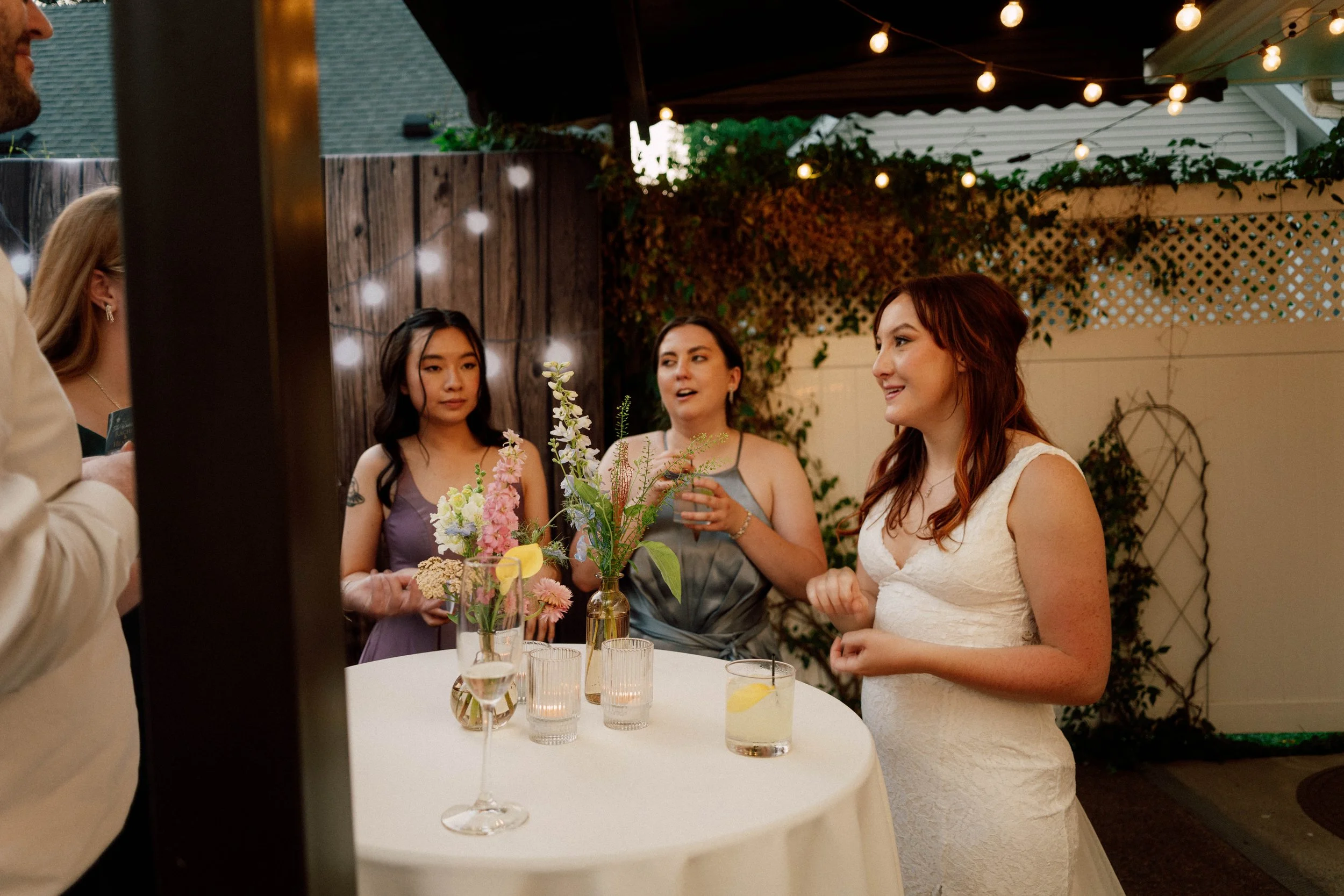 HRD73-bride-talking-to-guests-at-wedding.jpg