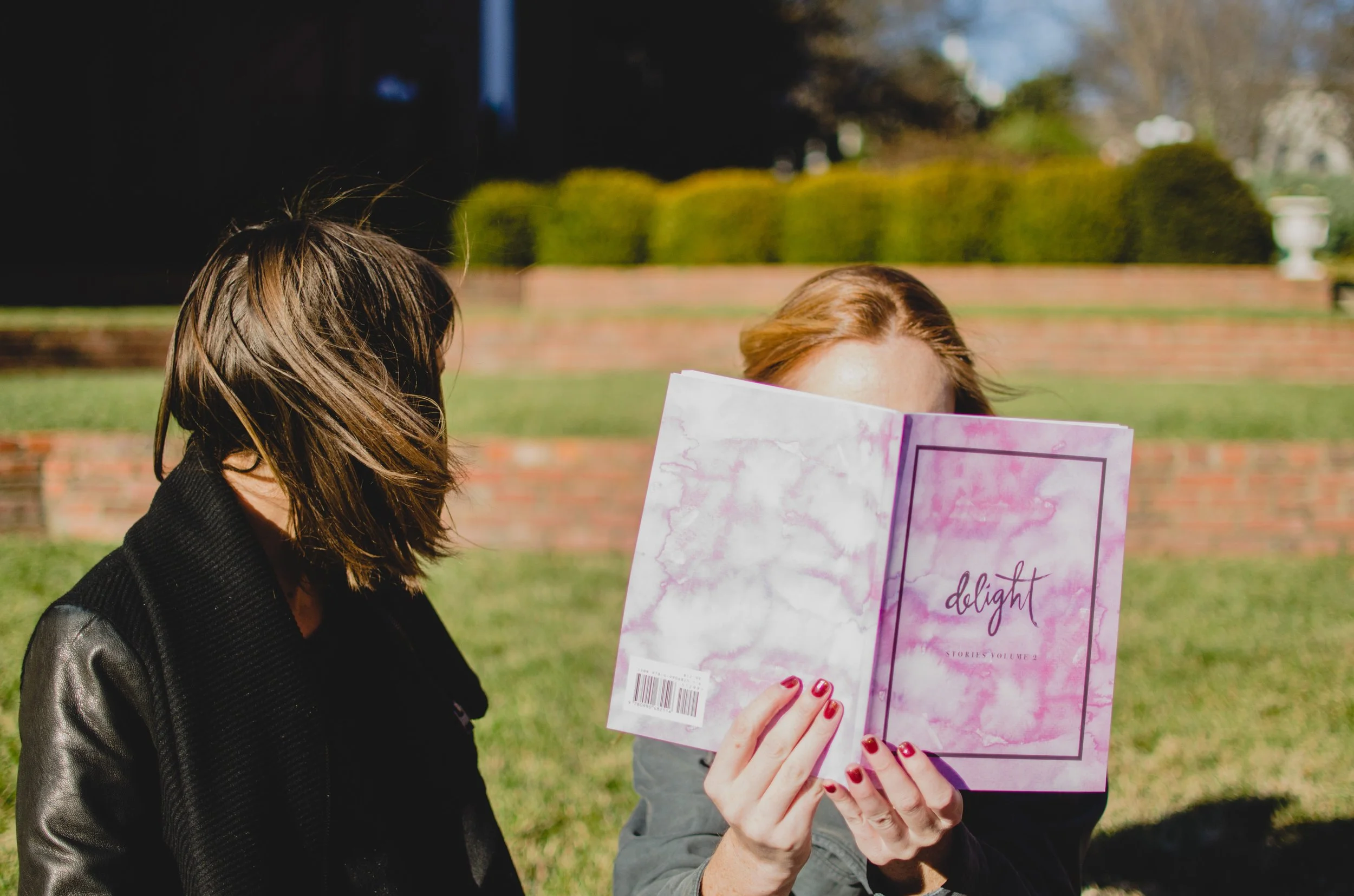 d45-woman-holding-delight-ministries-book.jpg