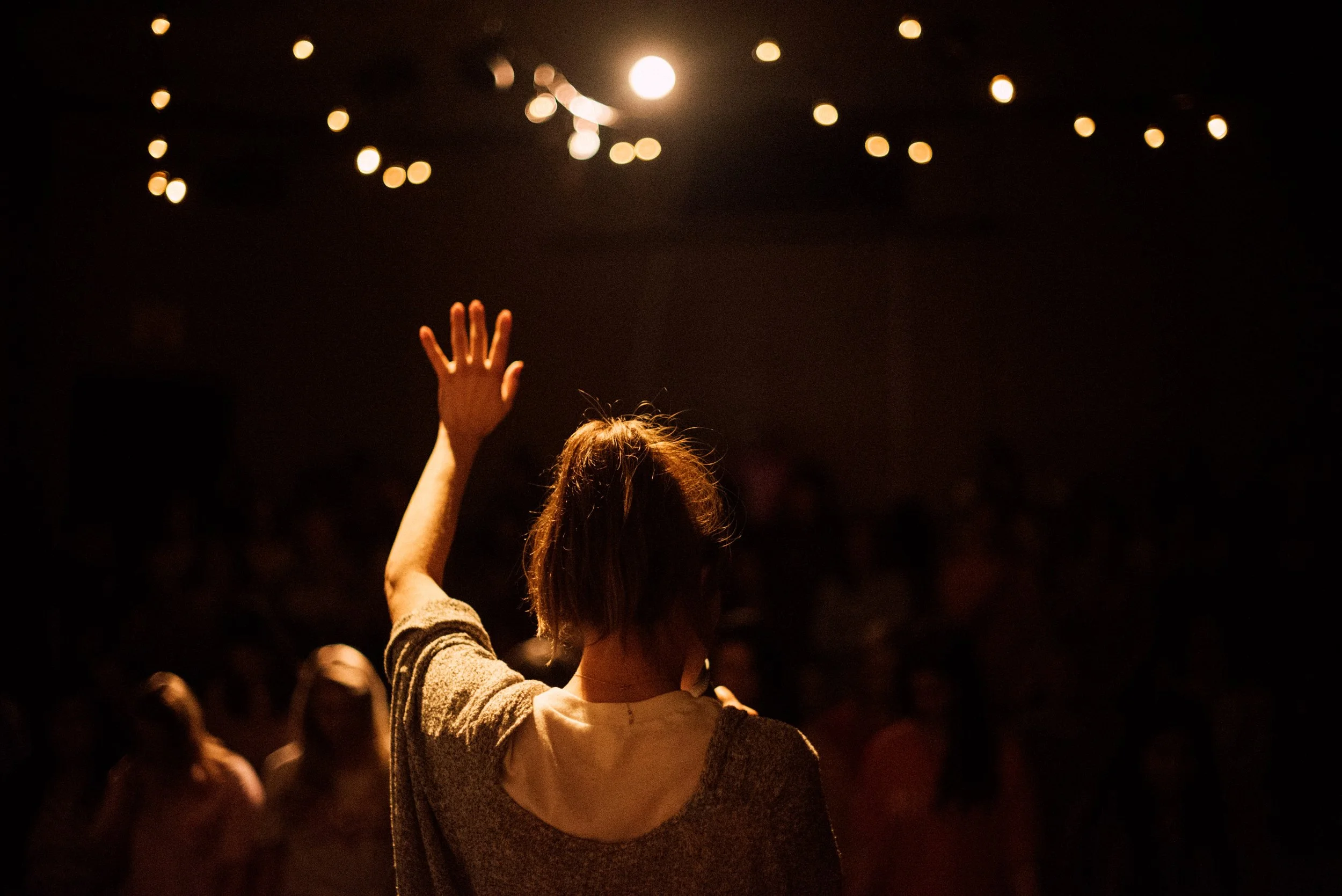 d272-woman-arm-raised-worship.jpg