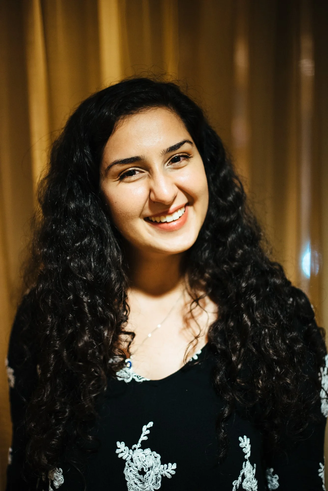 BT157-aclockworkreader-smiling-curly-hair.jpg