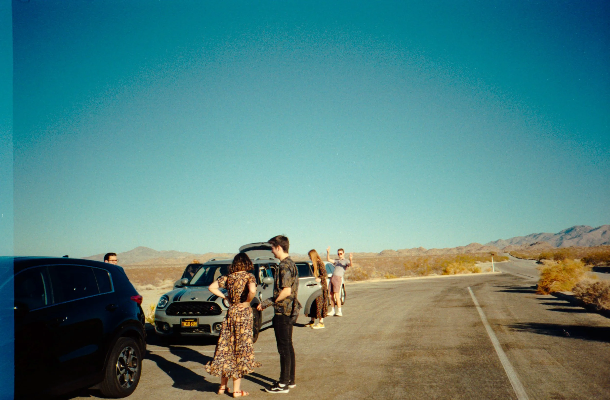 BT72-people-with-cars-in-desert.jpg