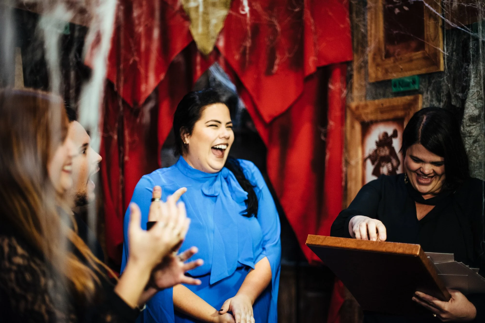 BT13-woman-blue-dress-laughing.jpg