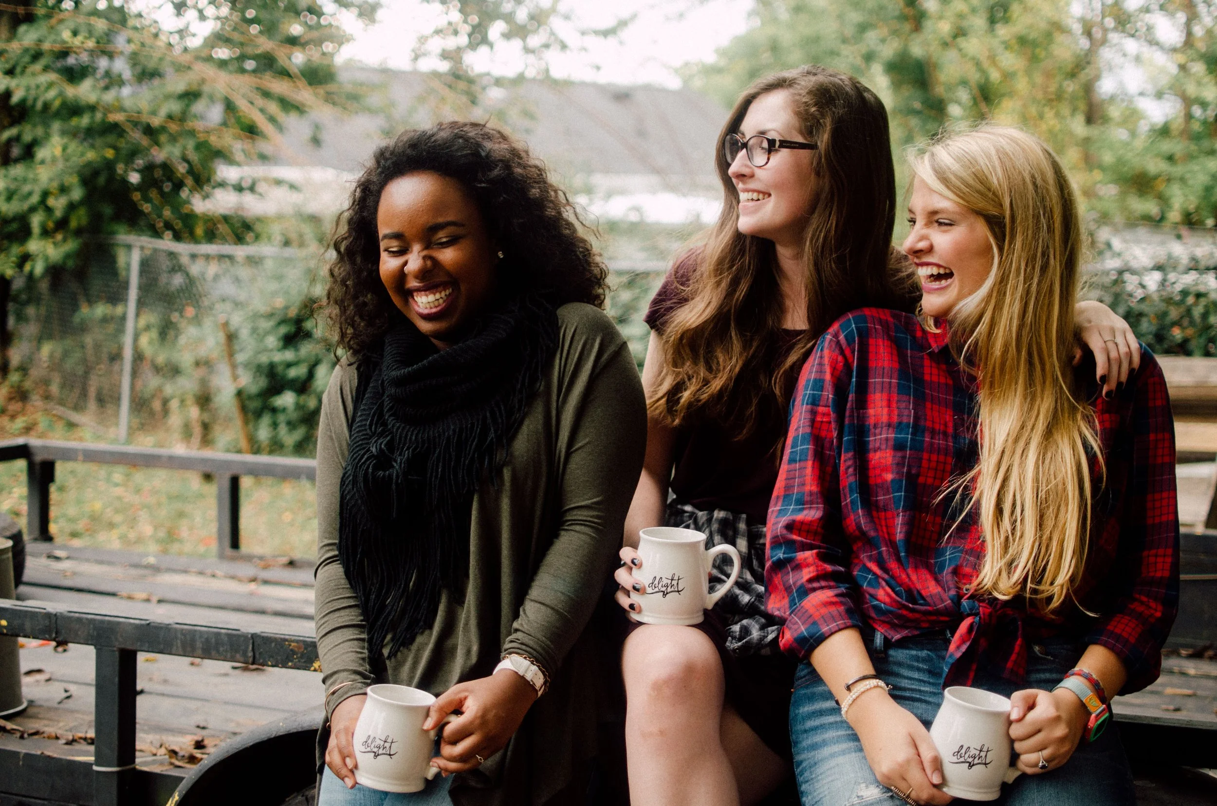 d110-college-women-laughing-mugs.jpg
