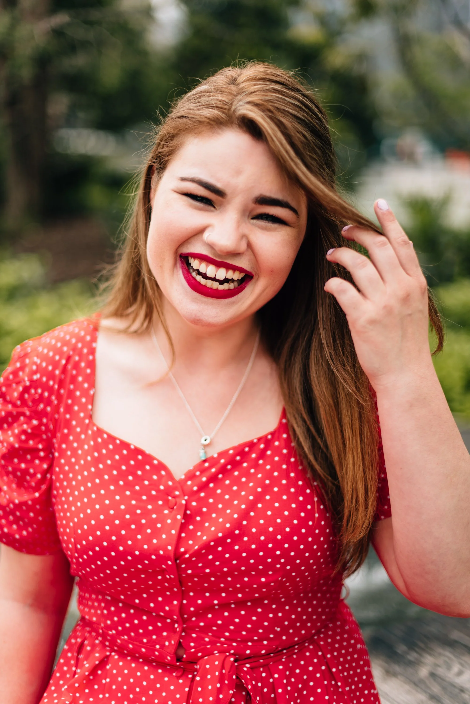 BT59-woman-laughing-red-dress-lipstick.jpg