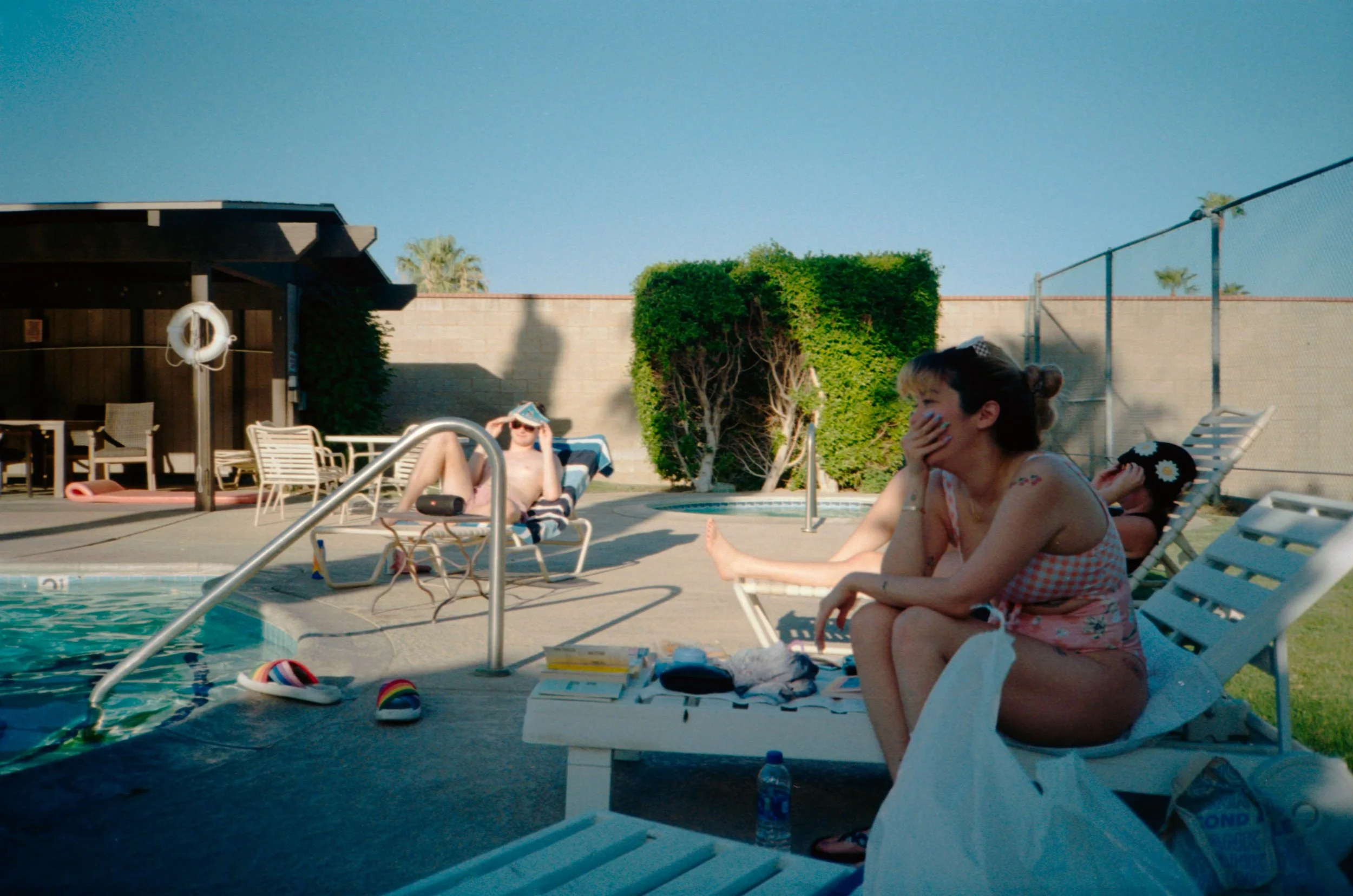 BT66-woman-sitting-by-pool.jpg