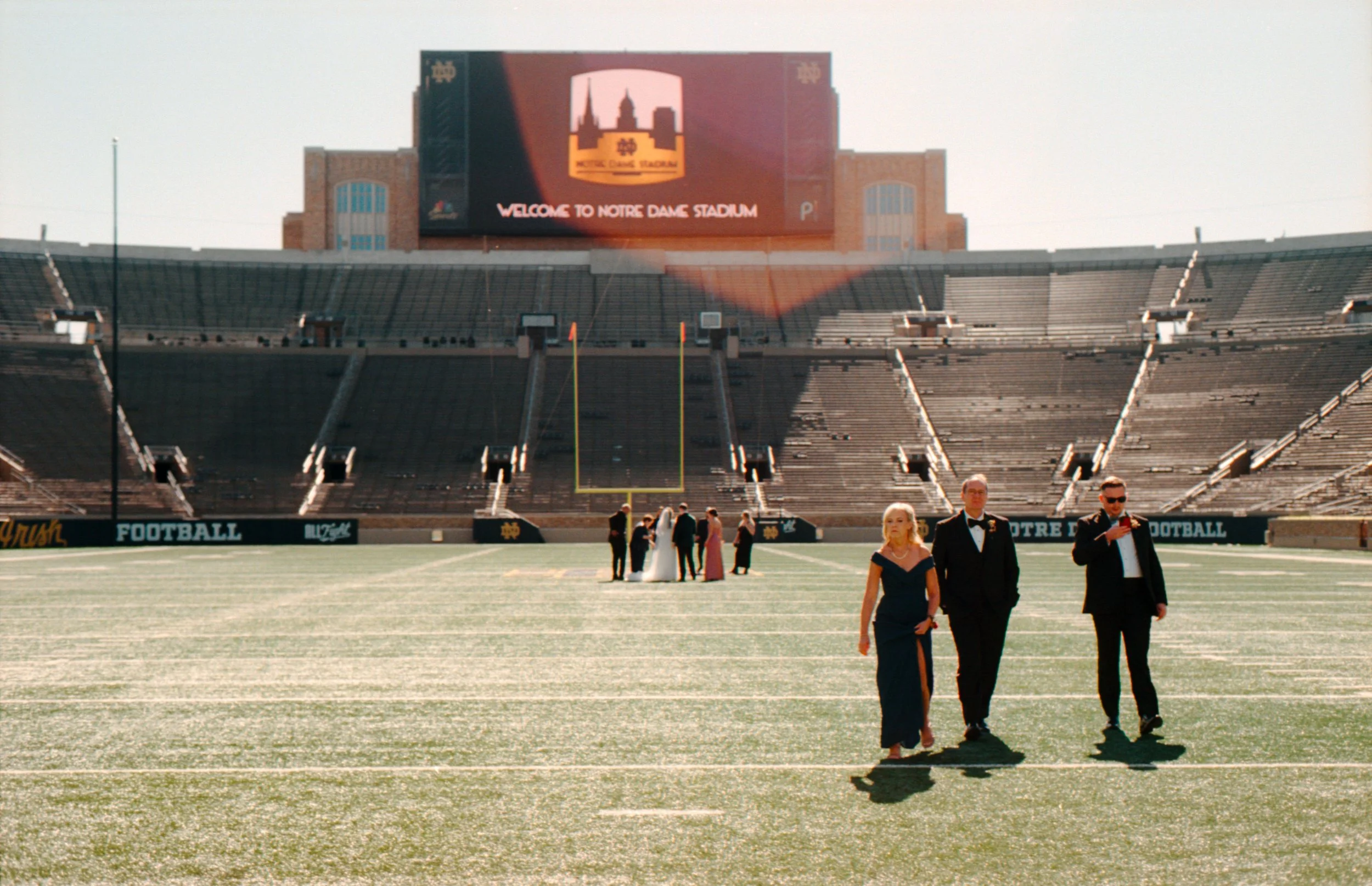 LBW43-wedding-party-on-field-notre-dame-university-stadium.jpg