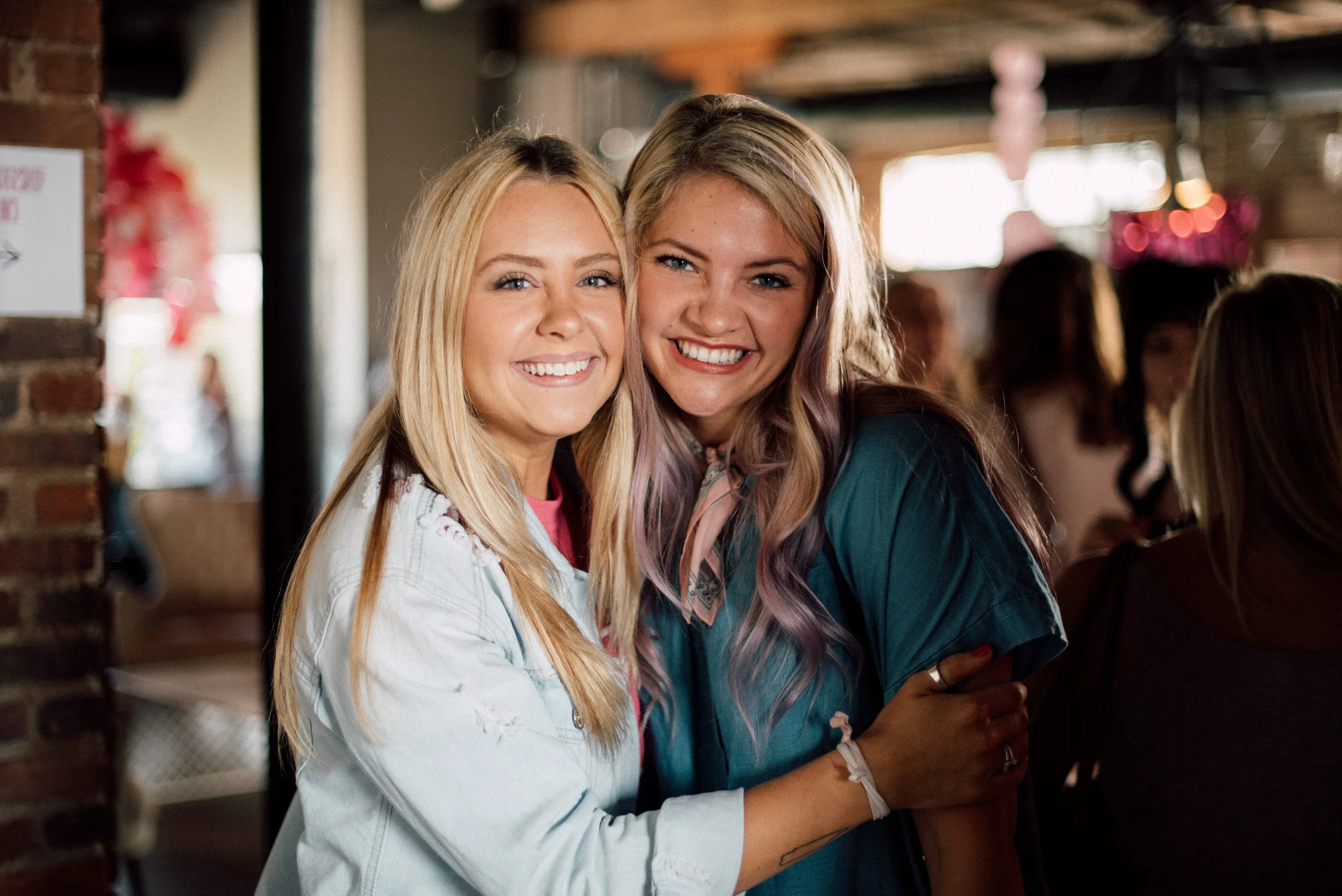 d211-blonde-women-smiling-hugging.jpg