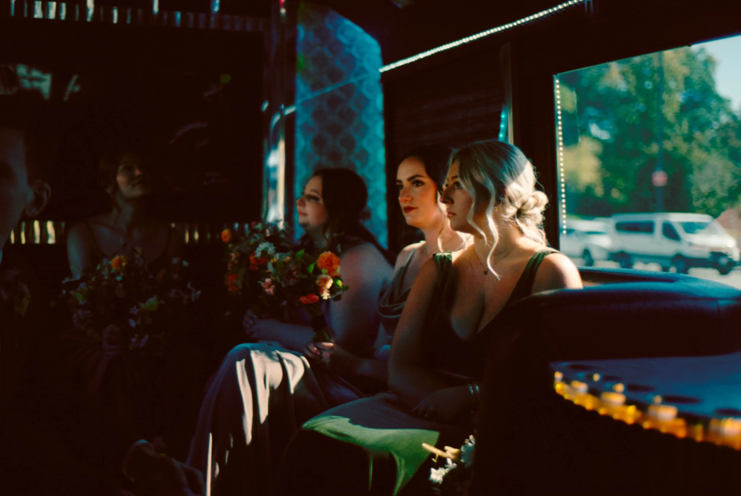 LBW28-bridesmaid-in-sunlight-in-limo.jpg
