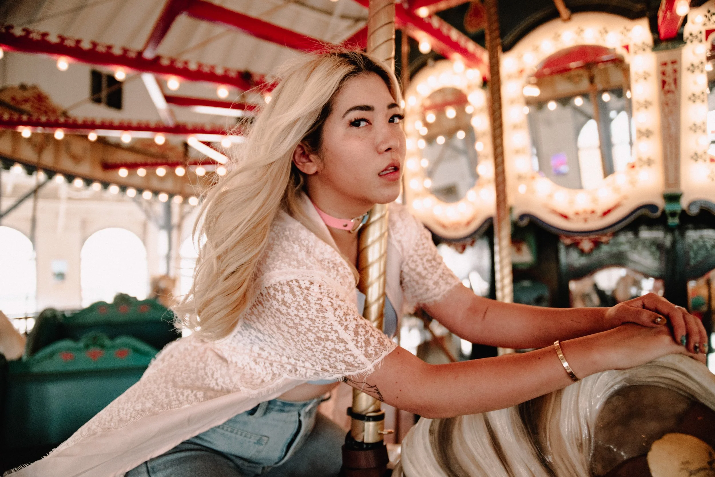 BT12-blonde-asian-woman-on-carousel.jpg