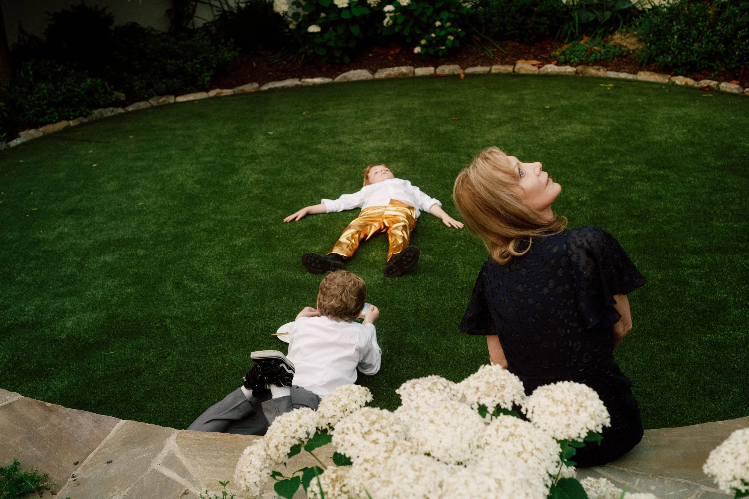 HRD65-woman-two-boys-looking-up-at-sky.jpg