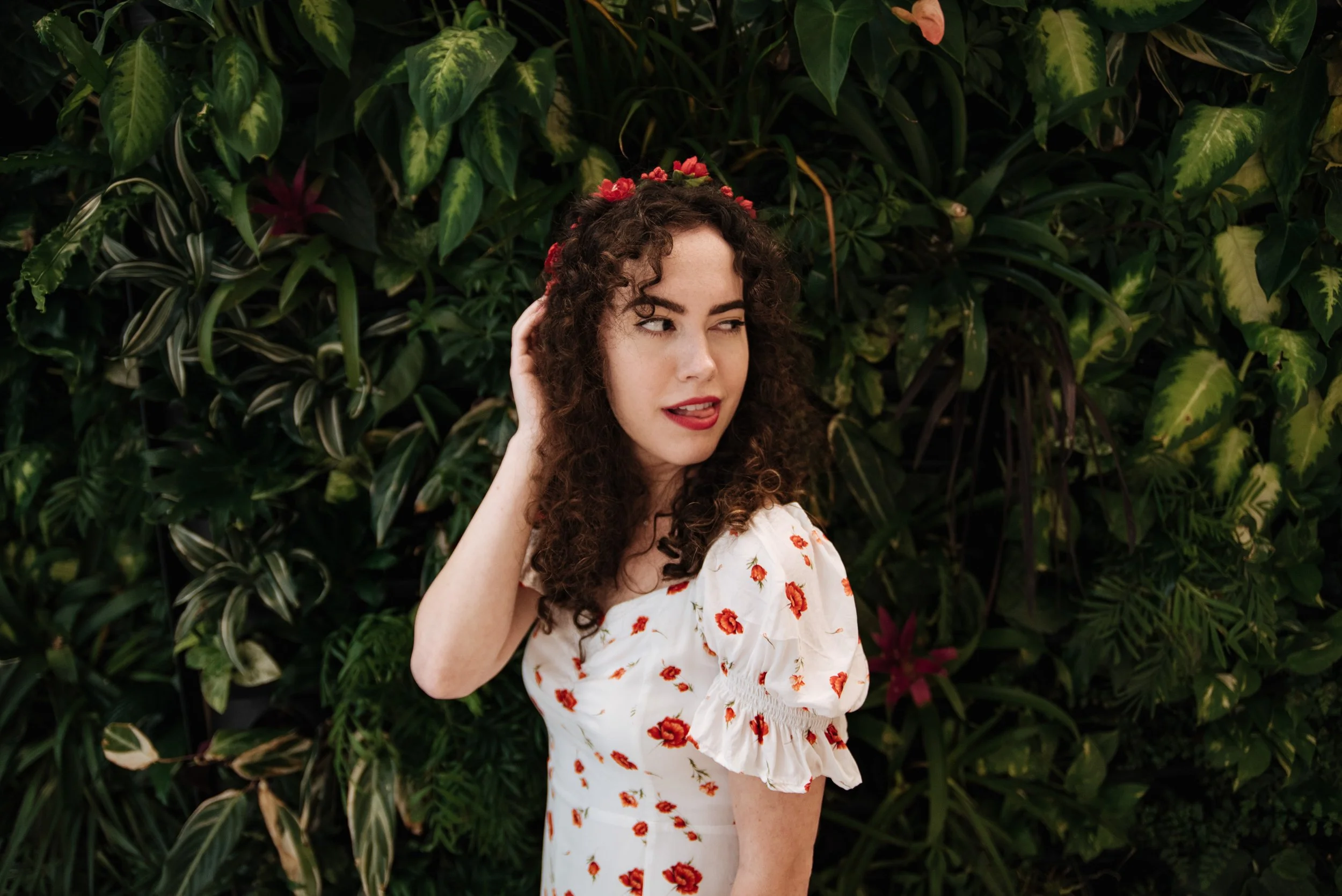 BT251-woman-tongue-out-in-greenery-leaves.jpg