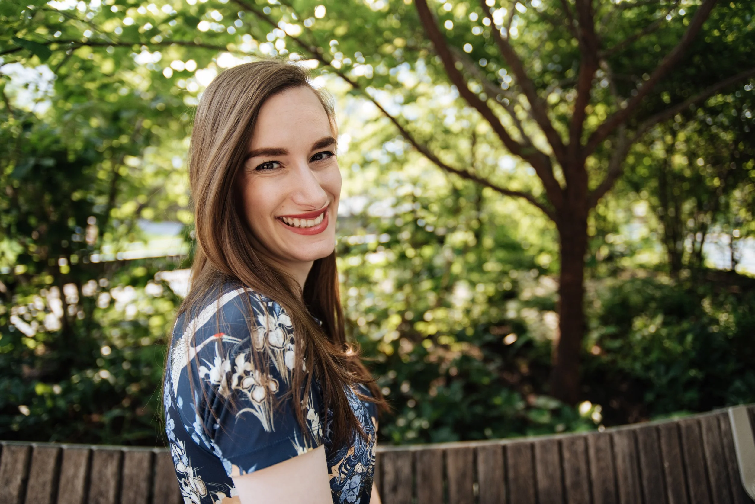 woman-under-trees-smiling.jpg