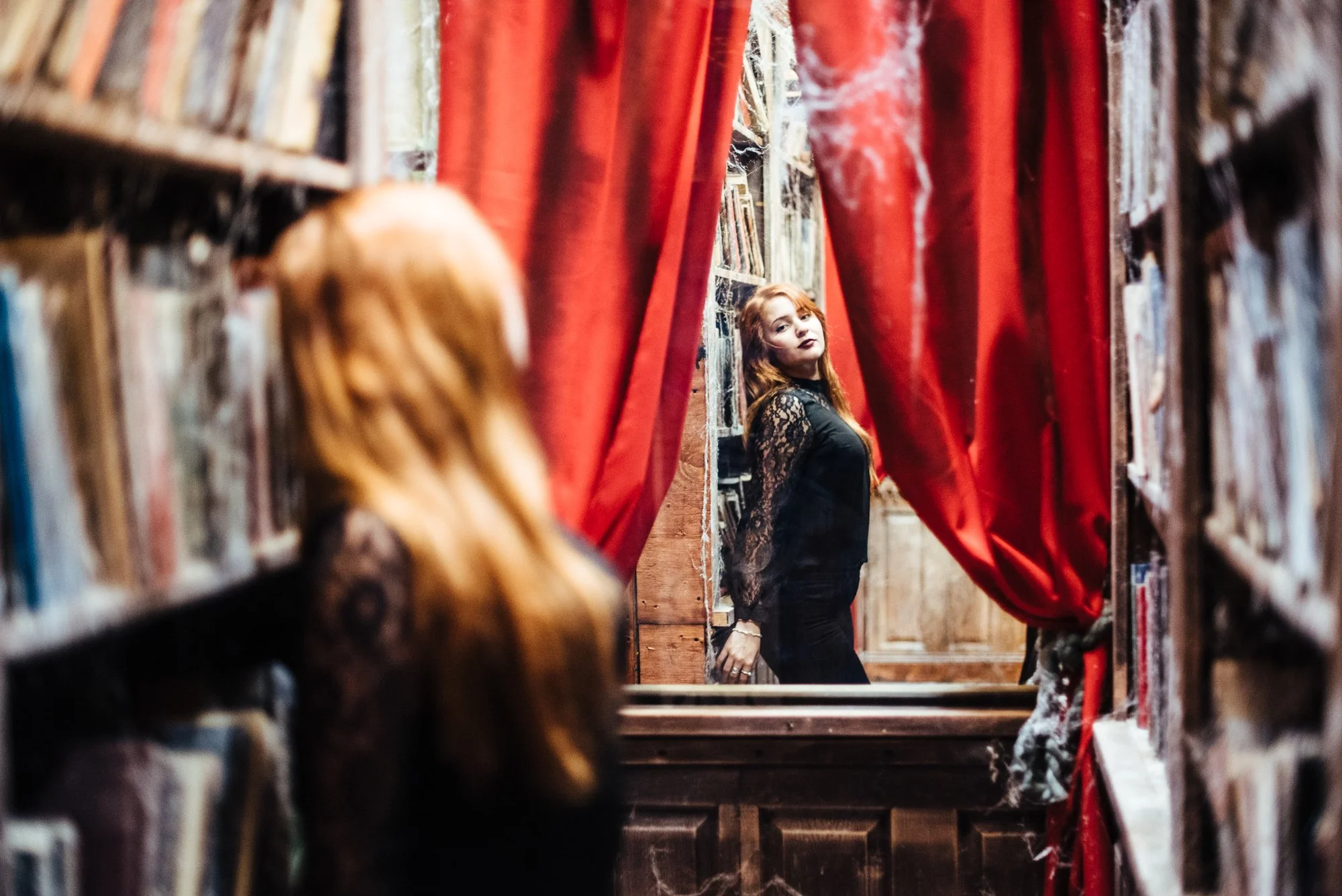 BT7-woman-in-mirror-red-curtain.jpg
