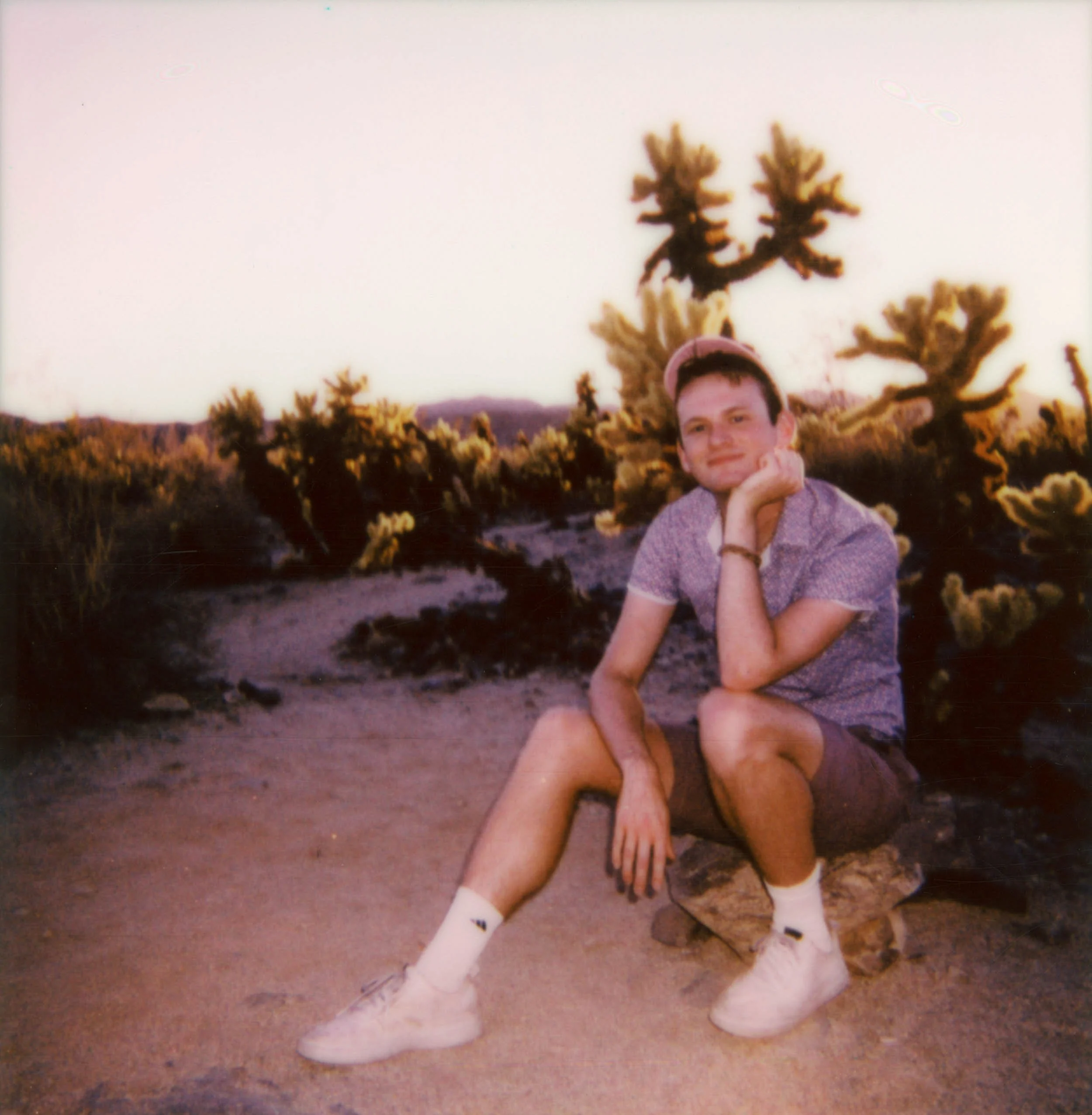 BT50-man-sitting-joshua-tree-ballcap-polaroid.jpg