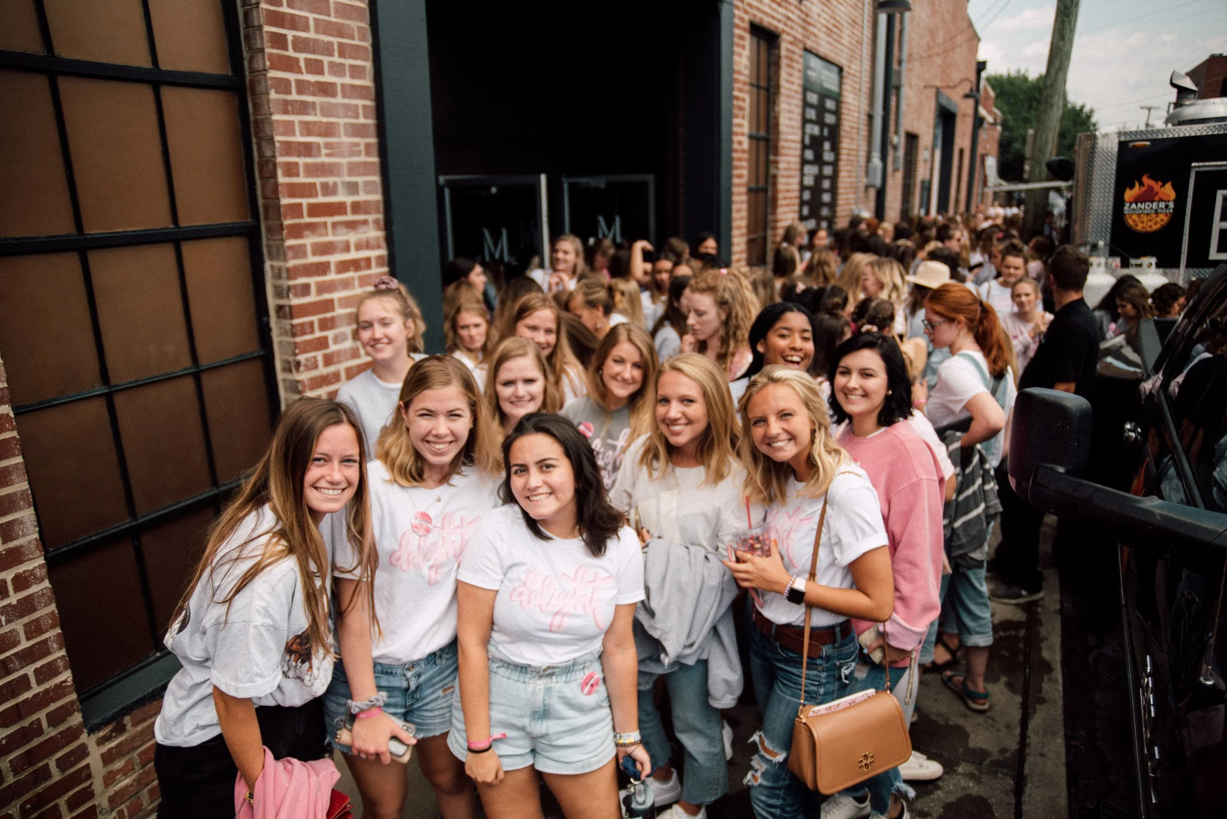 d305-women-smiling-posing-outside.jpg