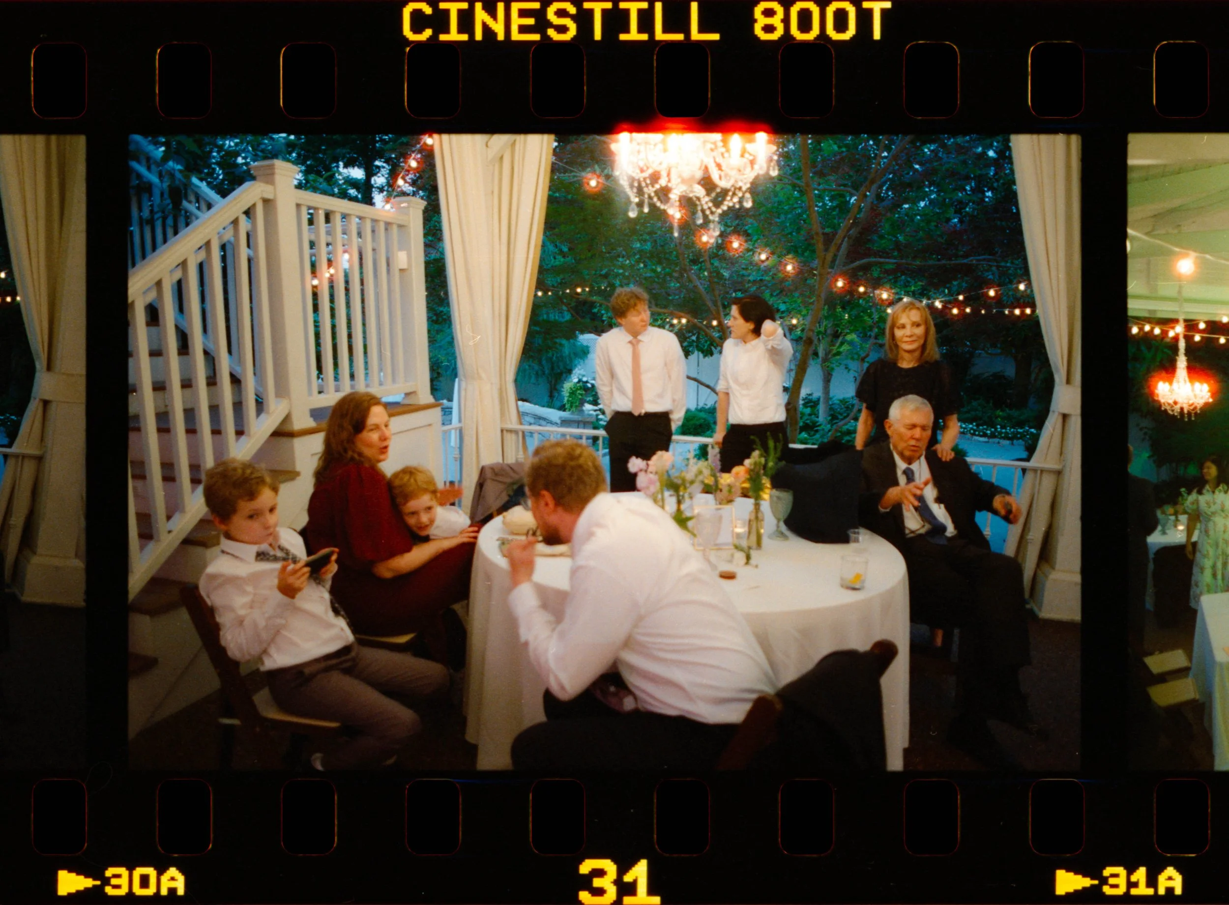 HRB27-family-sitting-at-table-at-wedding-reception.jpg