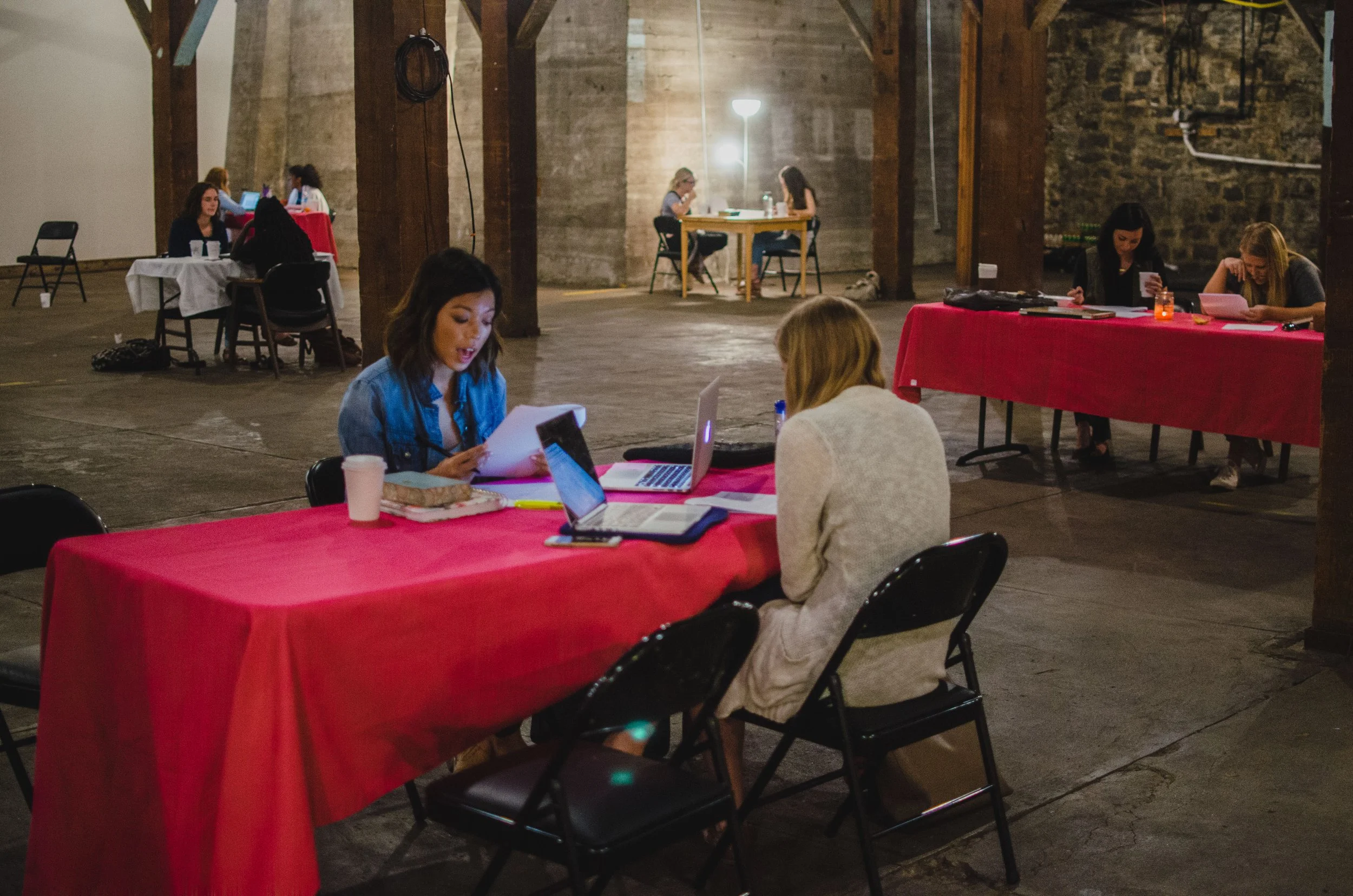 d101-women-at-tables-writing-laptops.jpg