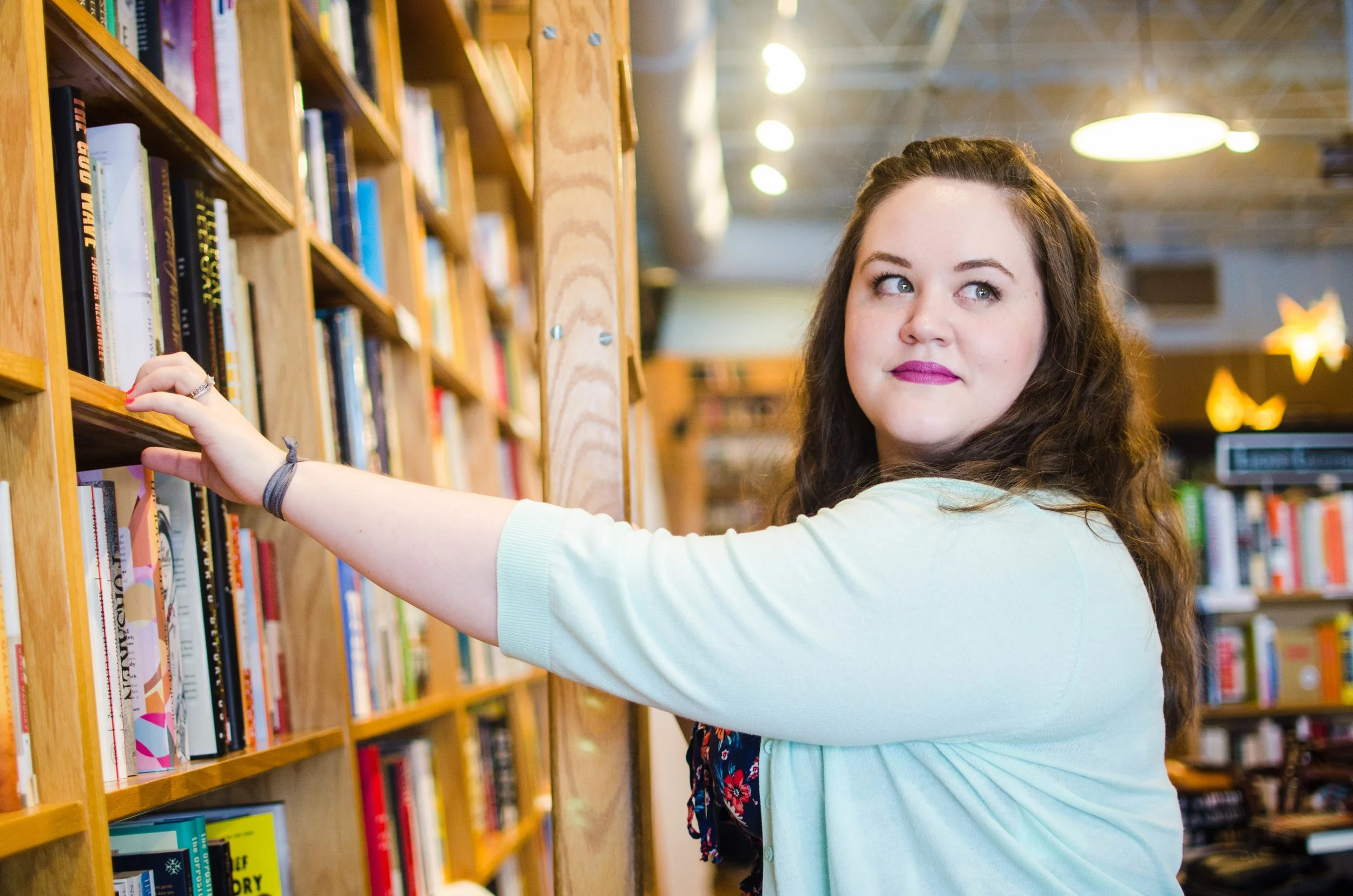 BT86-woman-standing-by-shelves-at-parnassus-books-nashville.jpg