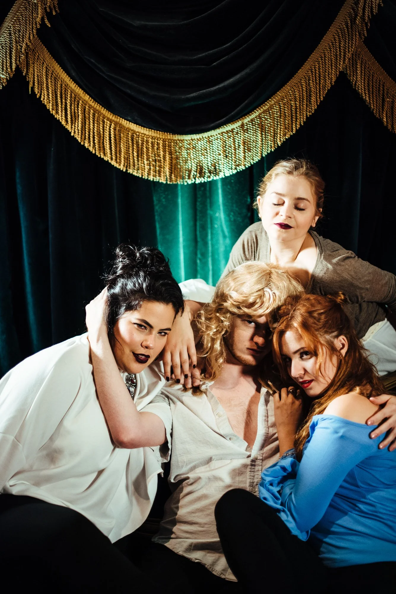 BT202-man-in-wig-surrounded-by-women.jpg